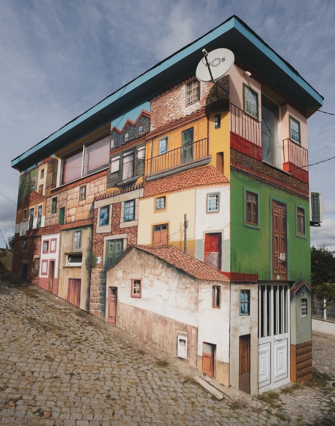 Vibrant street art mural in Portugal's Douro Valley