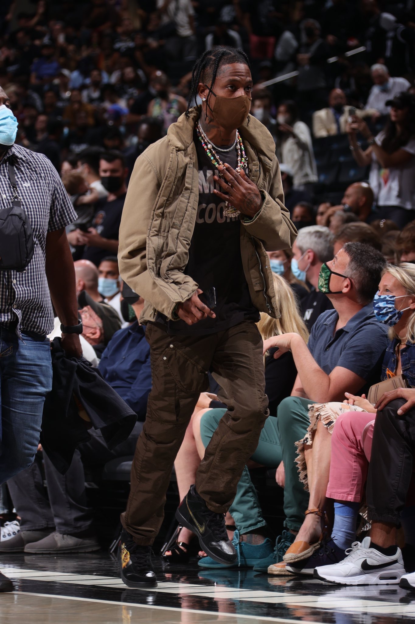 Travis Scott wearing the Nike SB Dunk High 
