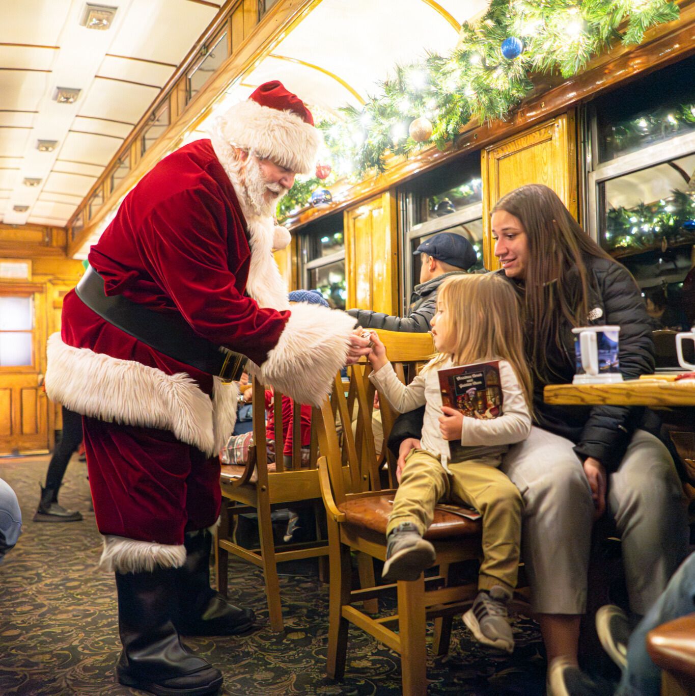 Take your seat, sip your cocoa, and unwrap the holidays with