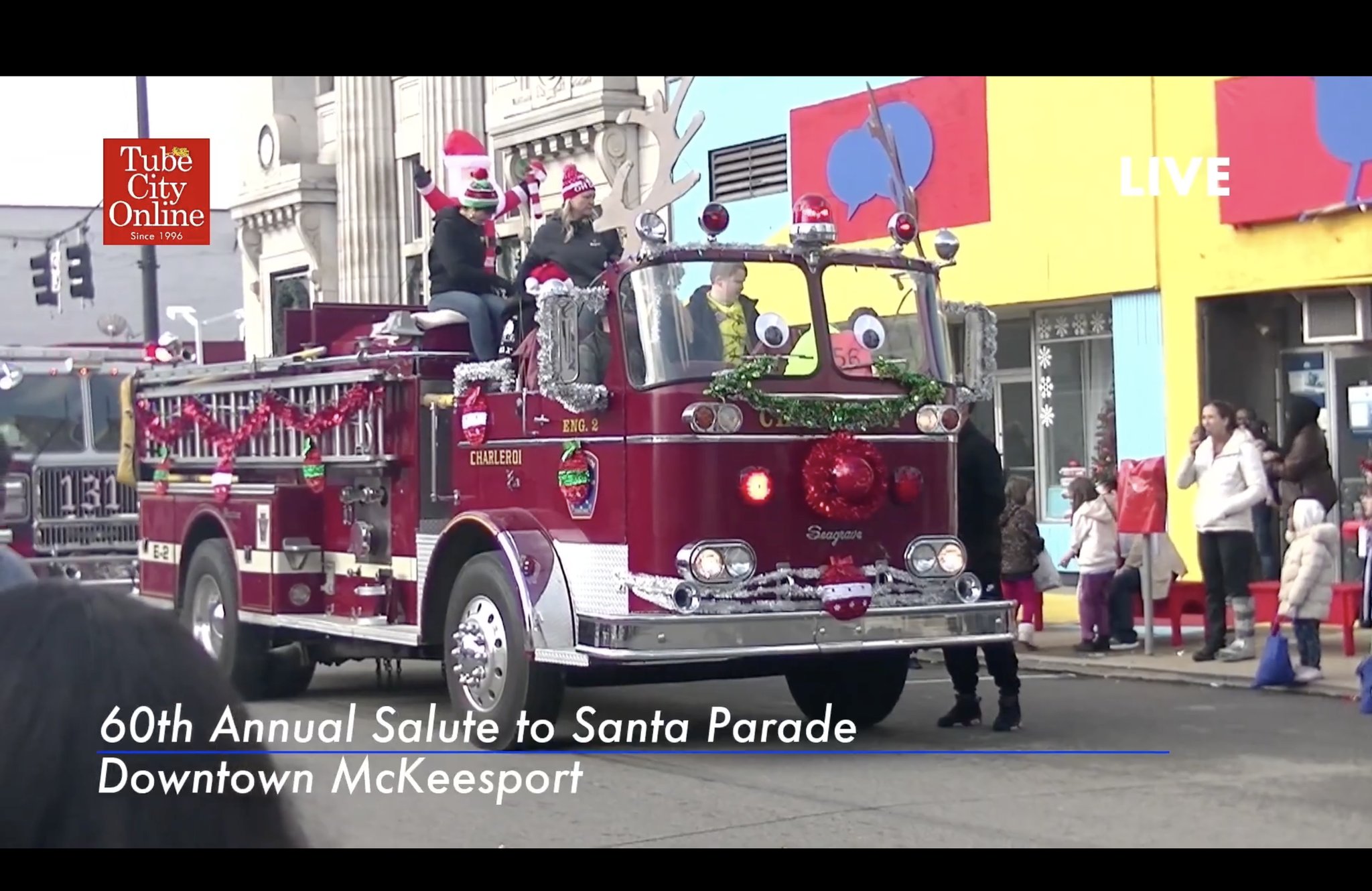 Tube - The city’s 60th annual Salute to Santa parade kicked off at 11 a ...
