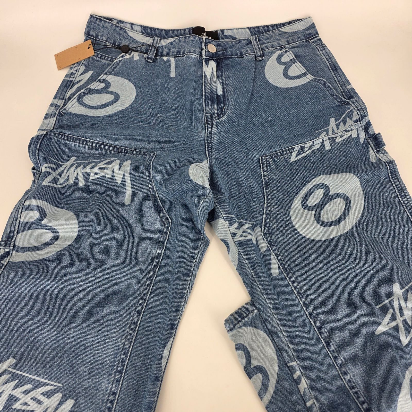 Stand out in style with these Stüssy 8 Ball Jeans in Blue 