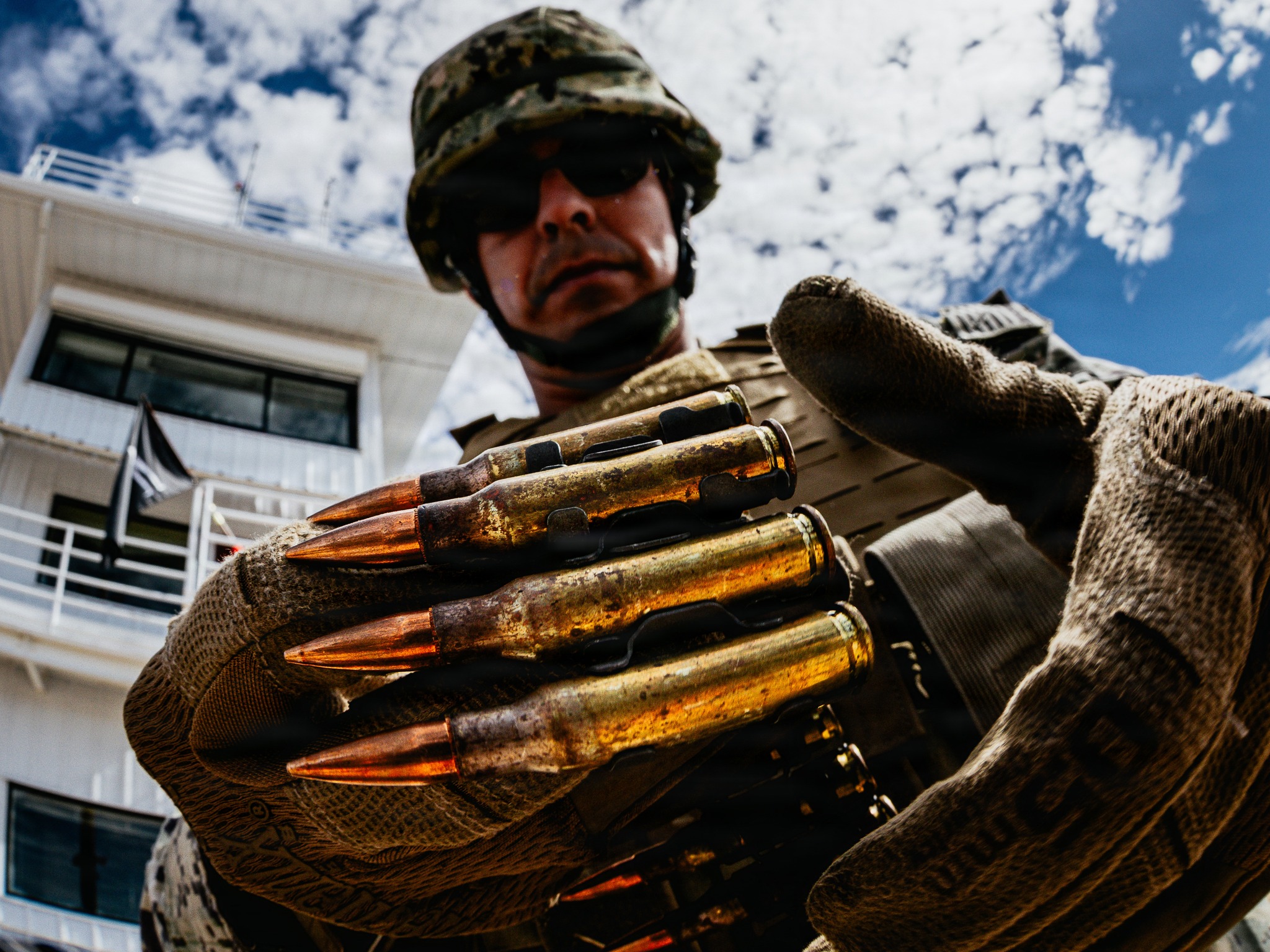 Naval - A Seabee with Naval Mobile Construction Battalion (NMCB) 3 ...