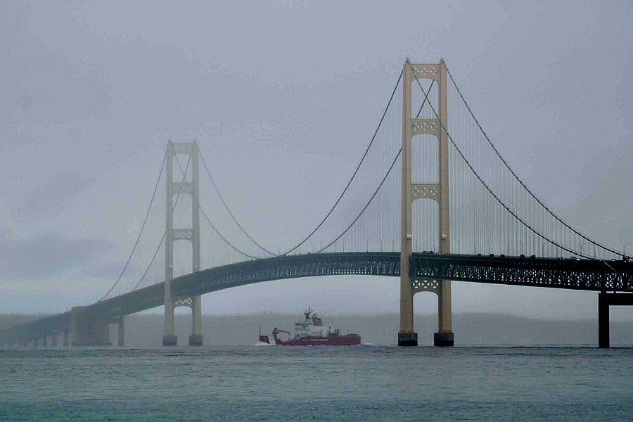 MightyMac.org - The USCG Cutter Mackinaw passing under the Mighty Mac ...