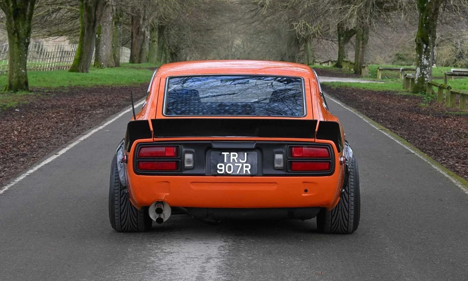 Ad - Restored 1976 Datsun 280Z in Mexican Orange with ZG arches