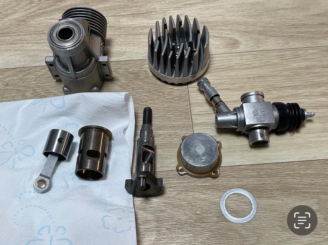 I completely overhauled and restored an old OS 21RF-B engine. I
