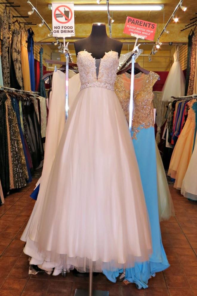 Concrete Angel for Her in Santee Alley has a beautiful selection of formal dresses for women. They offer different styles in a variety of colors, and textures. Concrete Angel for Her is