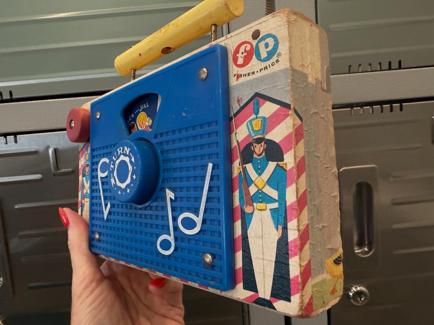 Fisher Price music box TV from the 60s. Complete wth Peek-a-boo screen