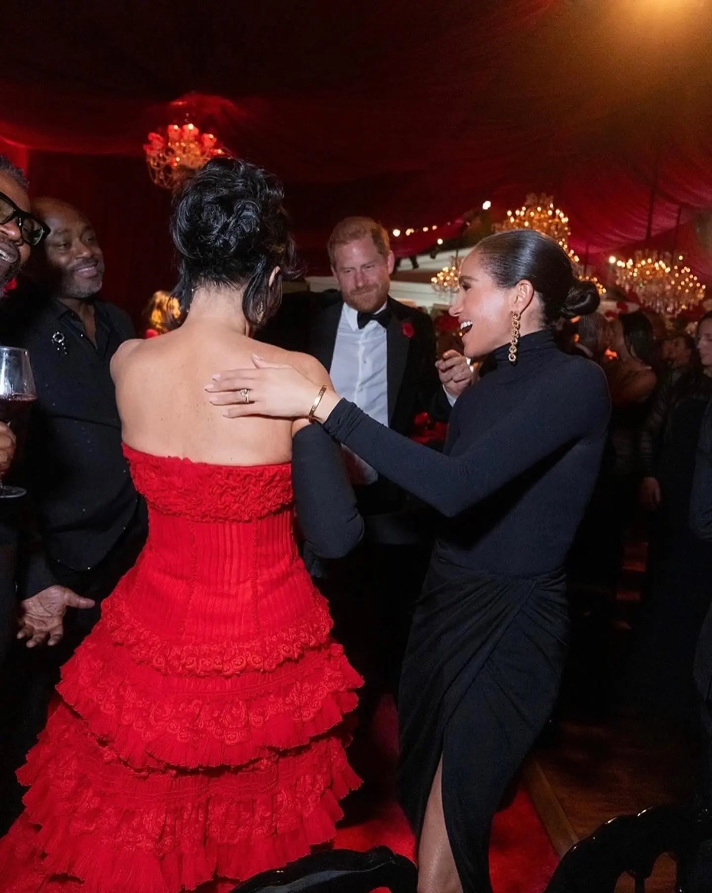 kim kardashian red dress birthday reveals what REALLY happened with those Meghan Markle and Prince Harry photos at Kris Jenner's 70th bash! 
