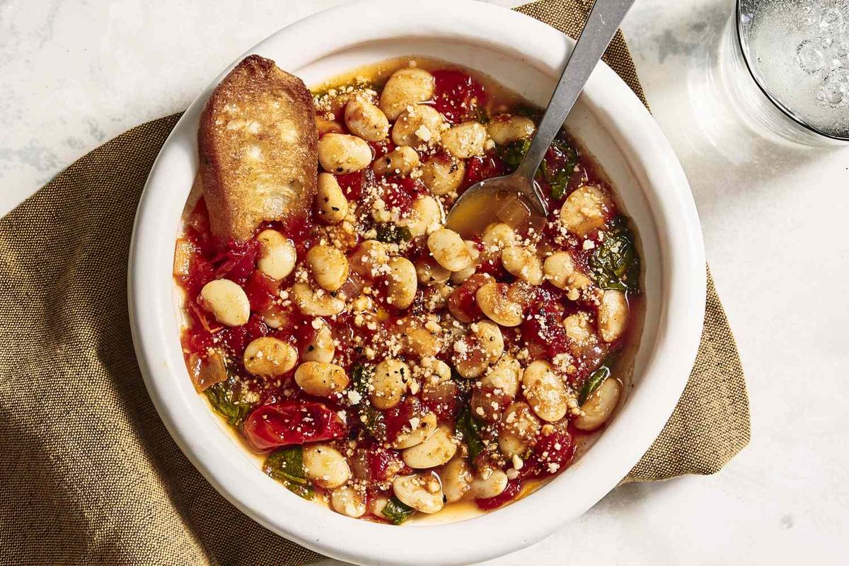 MyRecipes - This cozy butter bean stew builds fast flavor with sweet ...