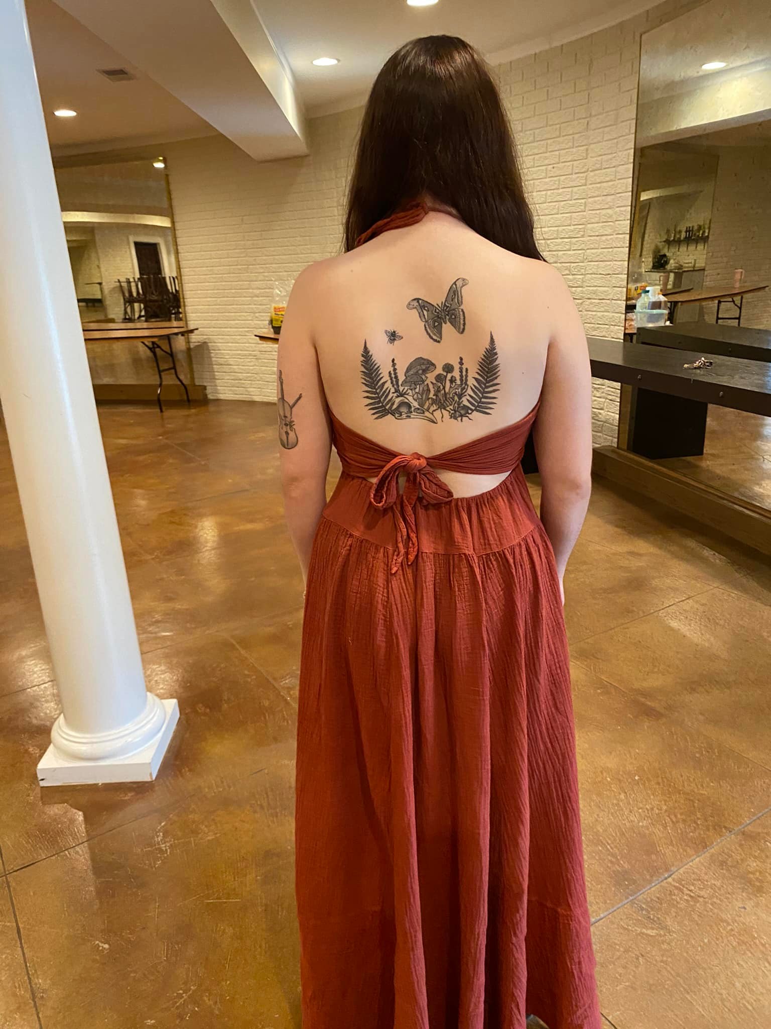 formal dress with tattoos What are good long dresses for a masquerade ball to show off back tattoos? elegant woman with tattoos