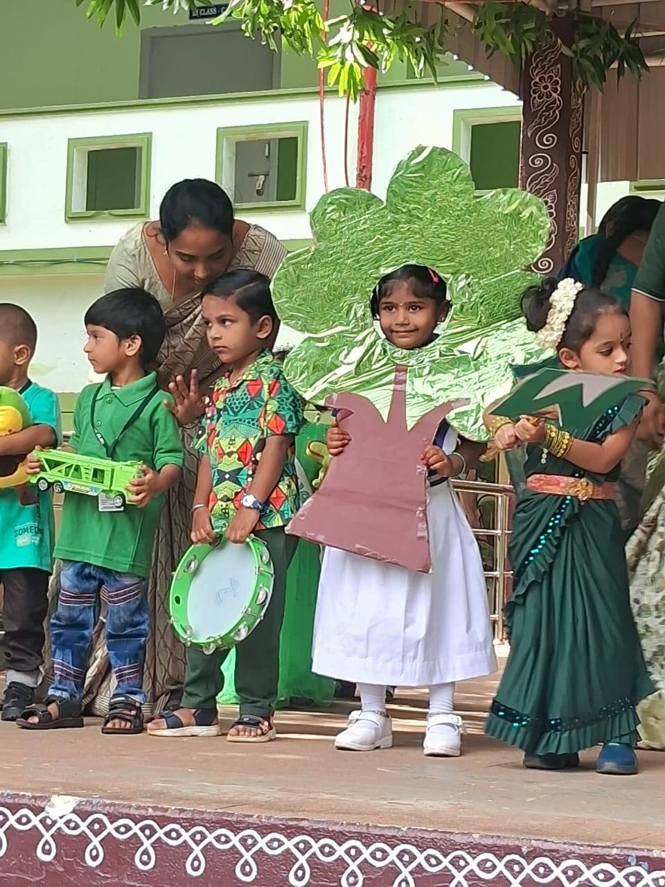 green dress day by L.K.G KIDS in CPHS East or West, Going Green is the Best, Go Green Breathe Clean. Currently, the paddy fields sown by farmers are lush green, and are Floor Length prom dress