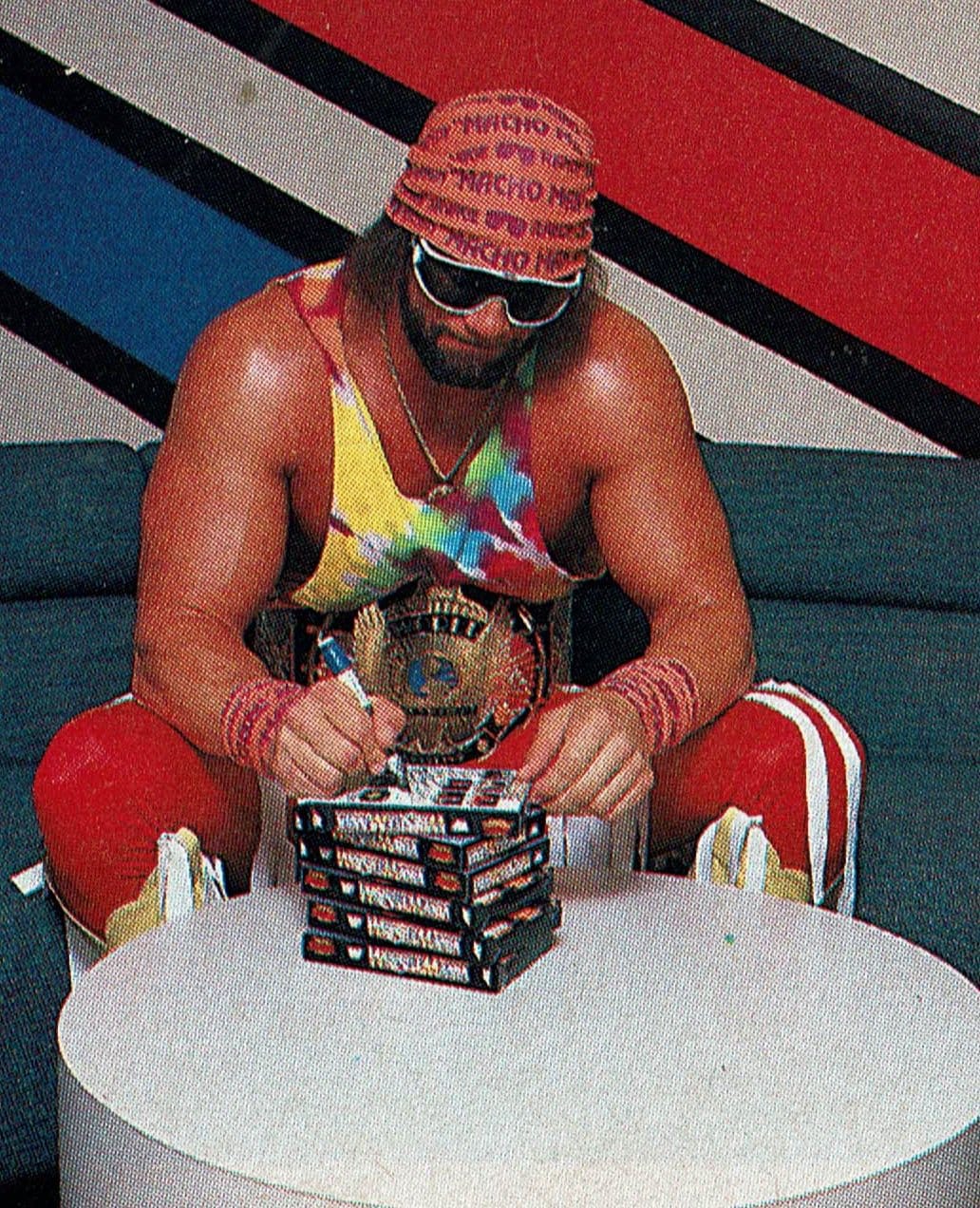 Macho Man Randy Savage signing WWF WrestleMania video games on the NES
