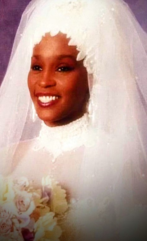On this day in 1992 Whitney Houston got married. Here is are pictures of the bride wearing her $40,000 Mark Bouwer wedding gown