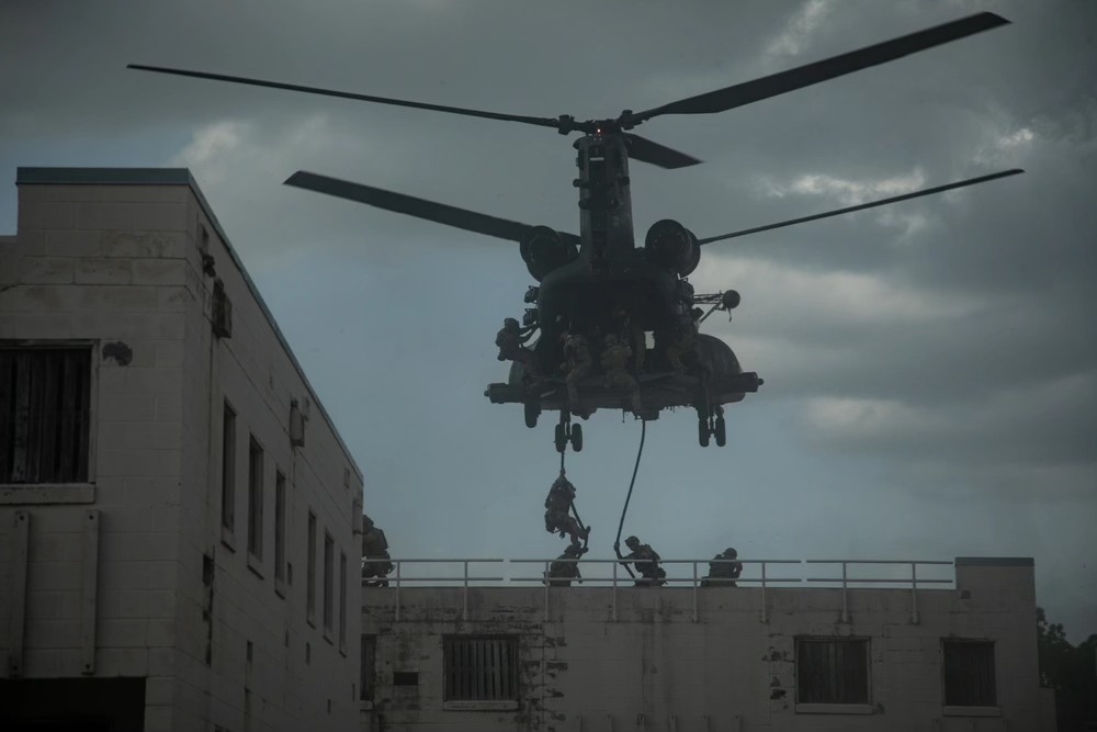 SOAA - U.S. Army Rangers assigned to the 75th Ranger Regiment fast rope ...
