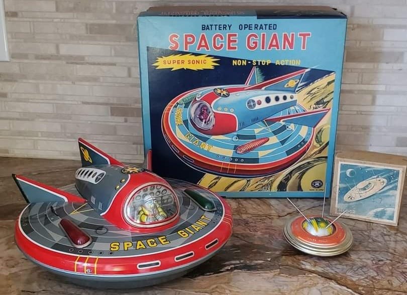 Two space-themed toys from my collection, with original boxes.