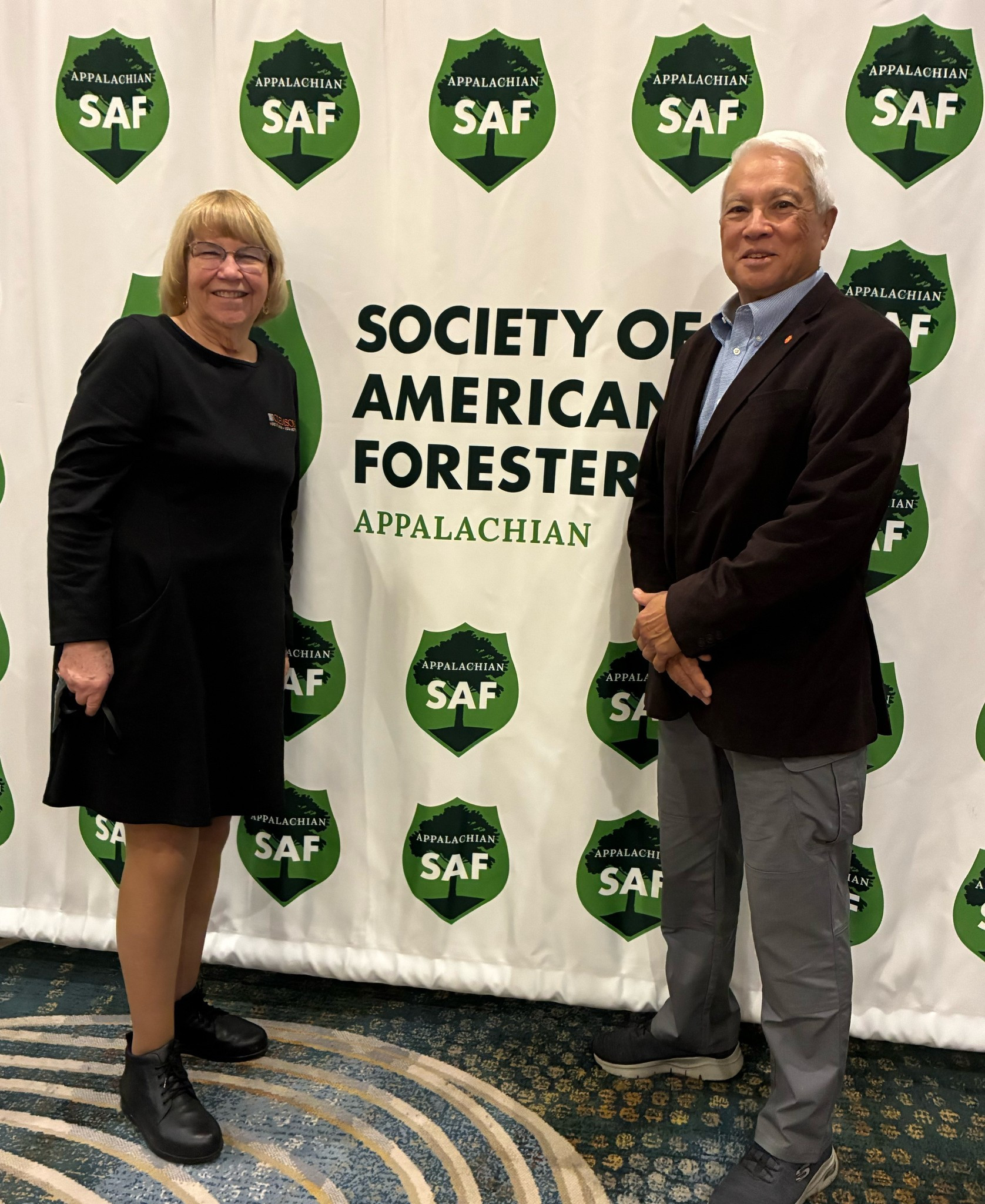 The South - Former State Forester Gene Kodama (2008-2018), right, and ...