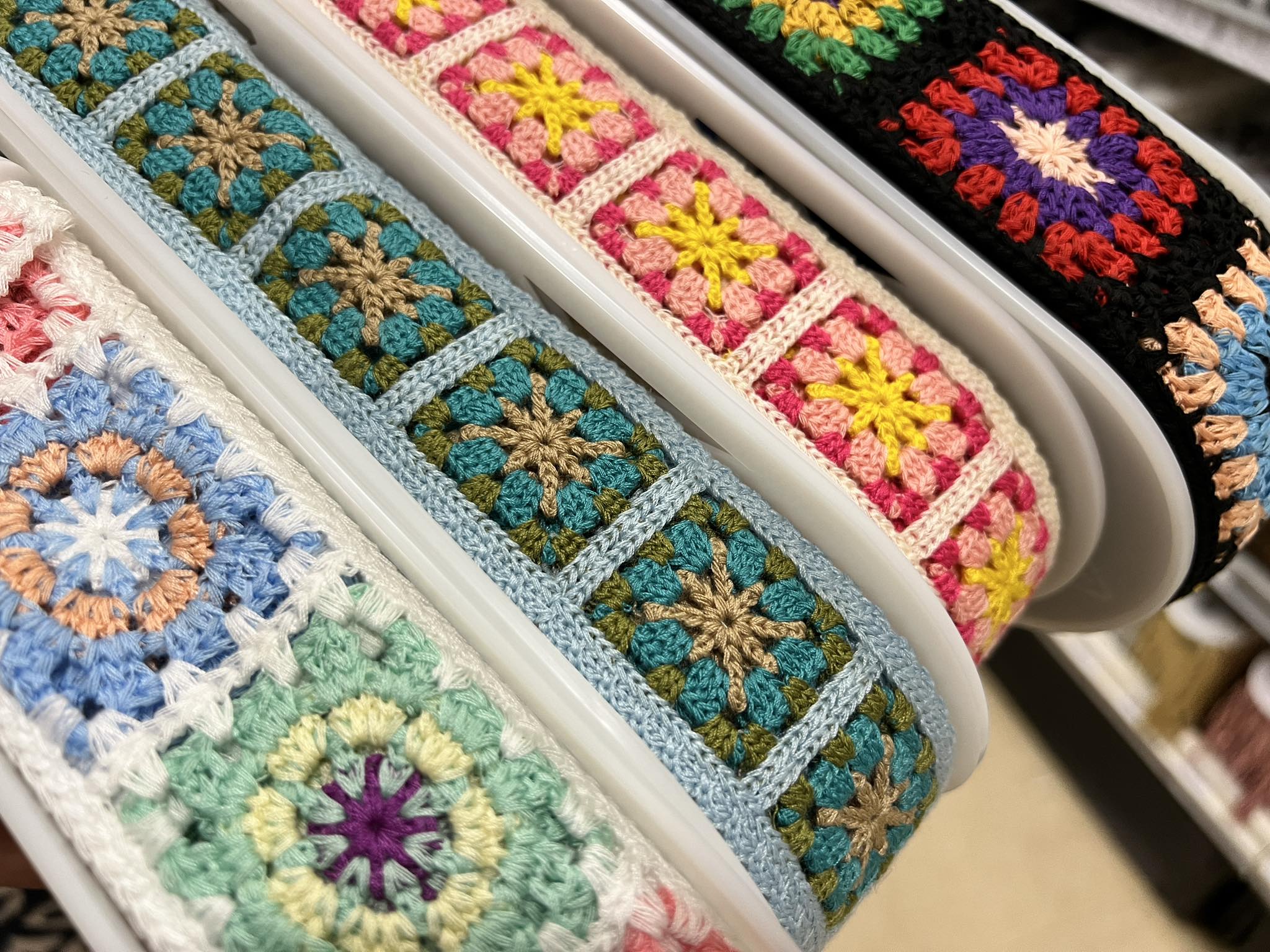 Ribbon section of Michaels. It's actually machine knit but looks