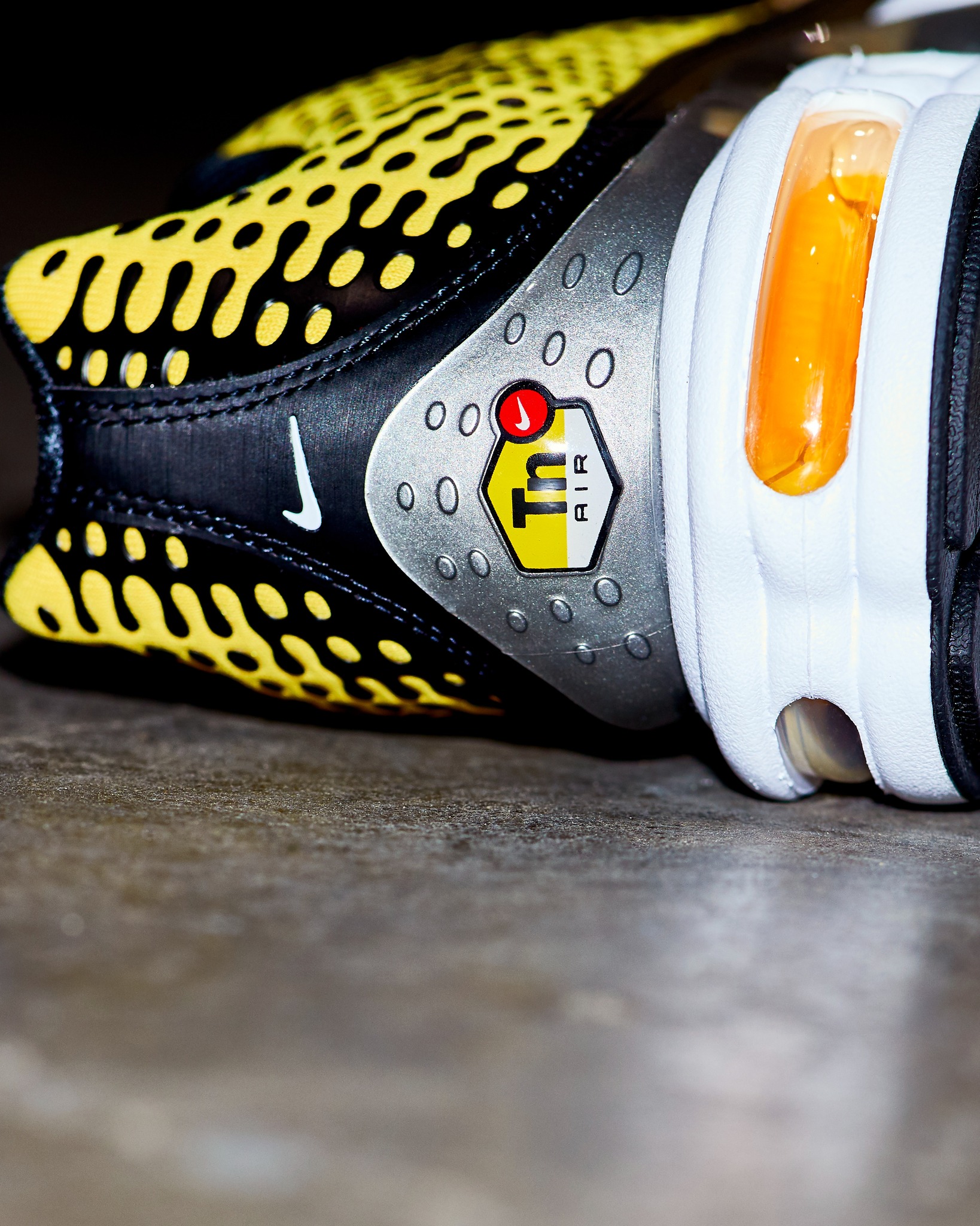 Bolder than ever. 💛 🖤 The Nike Tn7 Varsity Maize drops in men's