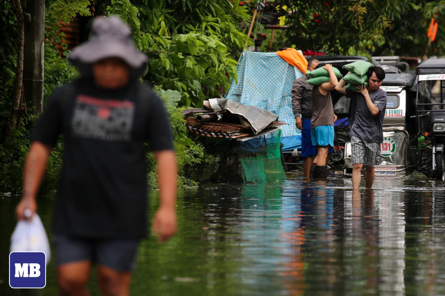 MANILA - LOOK: Residents of Angono, Rizal, wade through knee-to-waist ...