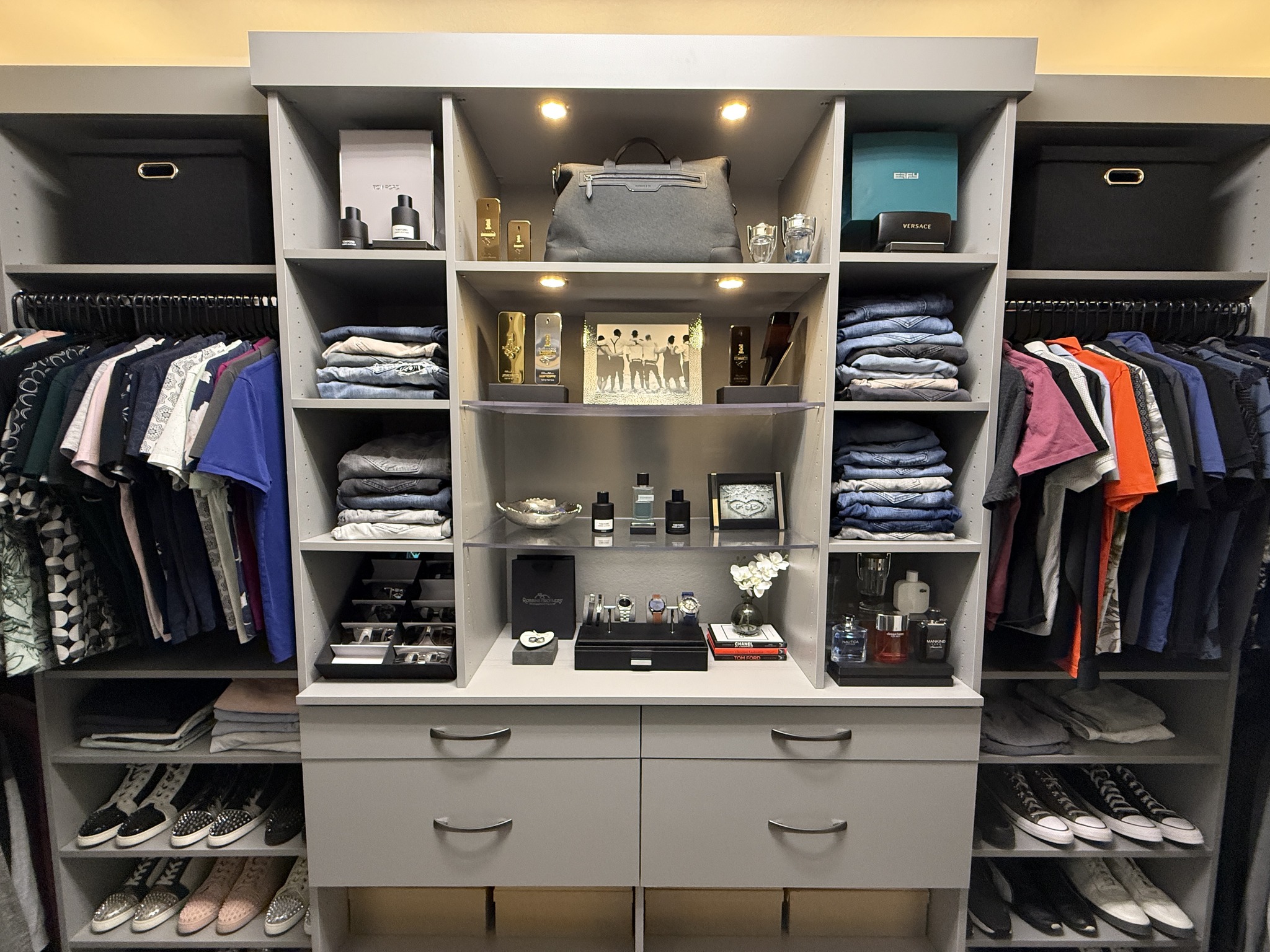 Closets - A modern, stylish men's walk-in closet that makes getting ...