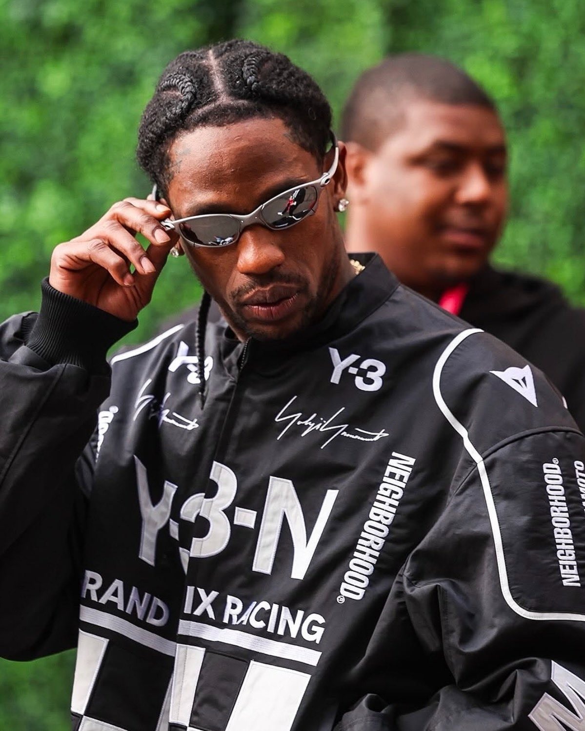 Travis Scott wearing a retro Tokyo Verdy shirt at the basketball