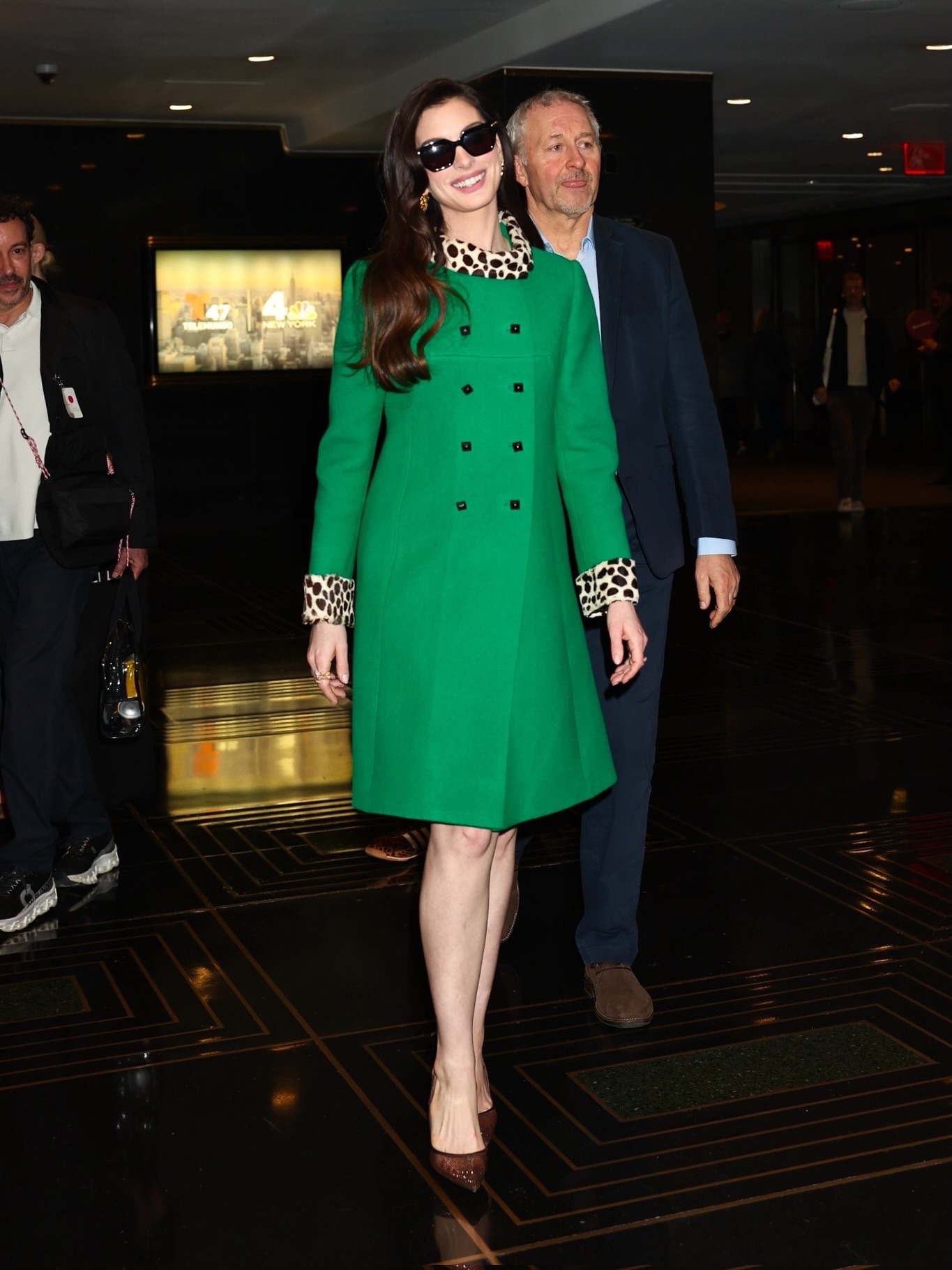 Full circle, in a single coat. Anne Hathaway closes out her The Devil Wears Prada 2 press run with a piece that needs no introduction—stepping out in the exact vintage green coat