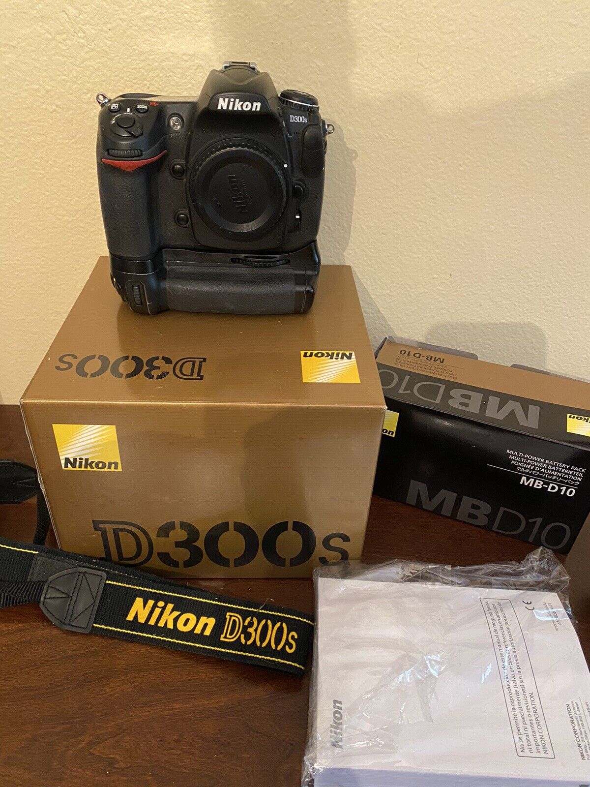 Nikon D300s with MB-D10 grip for $140 on eBay