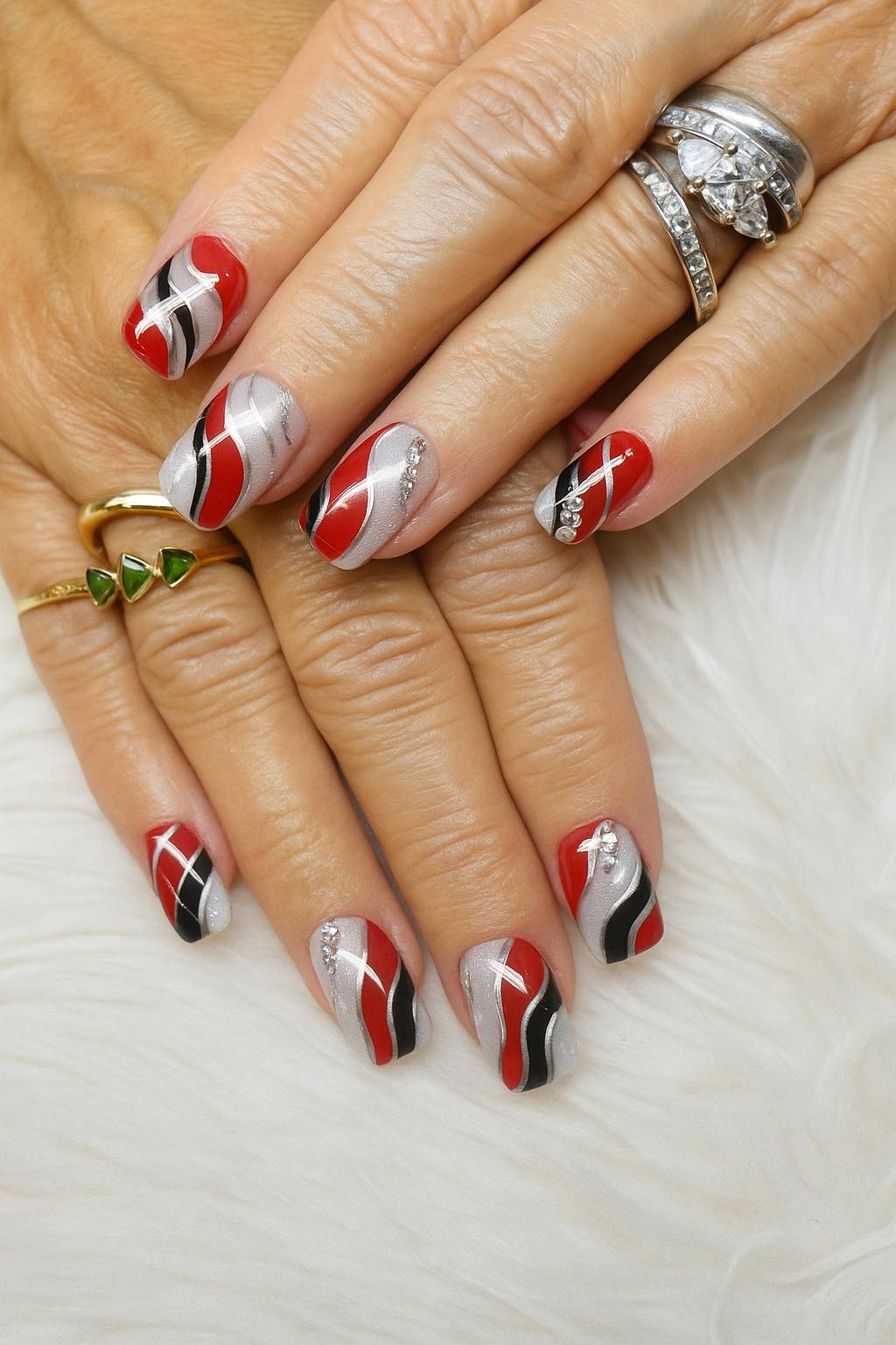 VO1 - Bold meets elegance — VO1 nails with a striking swirl of red ...