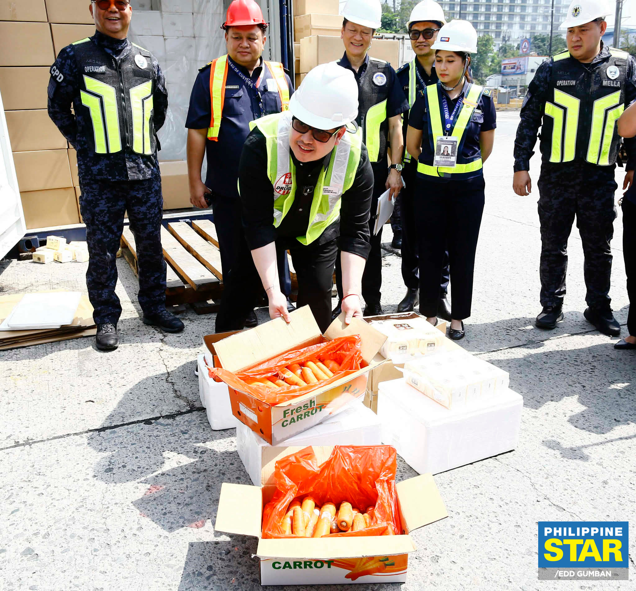 Philippine - Members of the Bureau of Customs (BOC) show the three ...