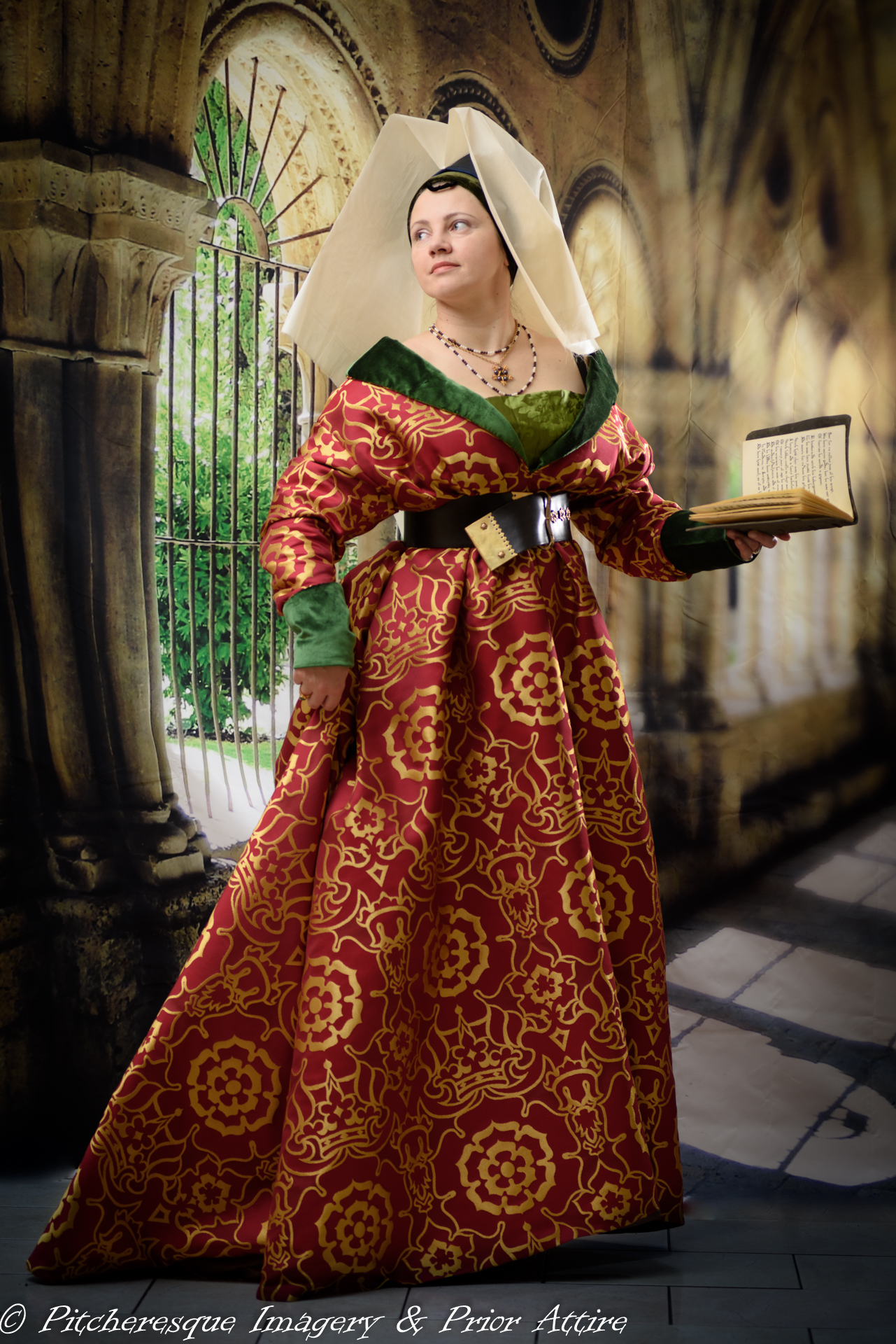 A dress that doesn't whisper. It commands attention. Our take on the Burgundian gown blends flowing elegance with a bold silhouette. Long, fitted sleeves, a deep V neckline, and a trailing back