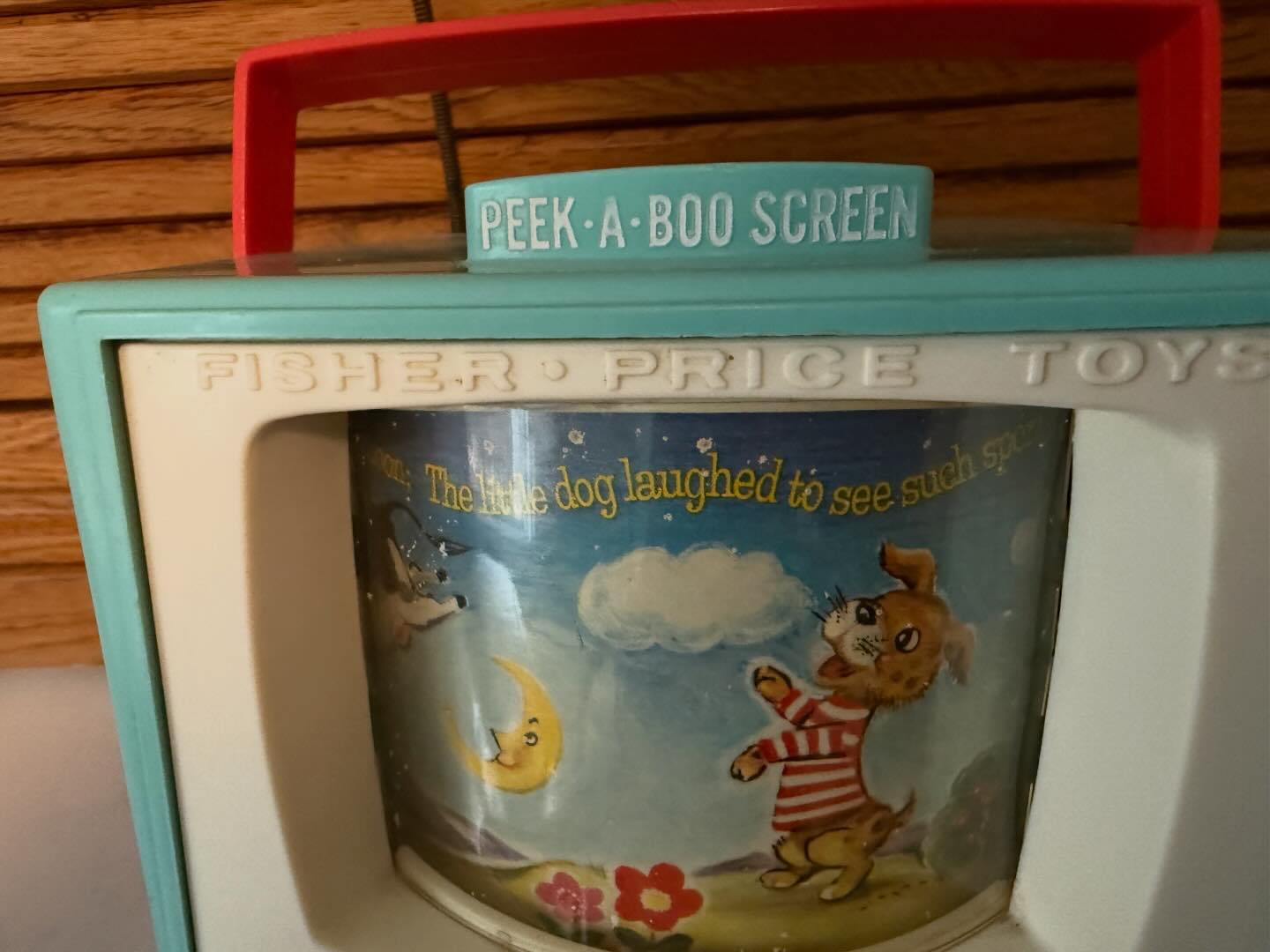 Fisher Price music box TV from the 60s. Complete wth Peek-a-boo screen