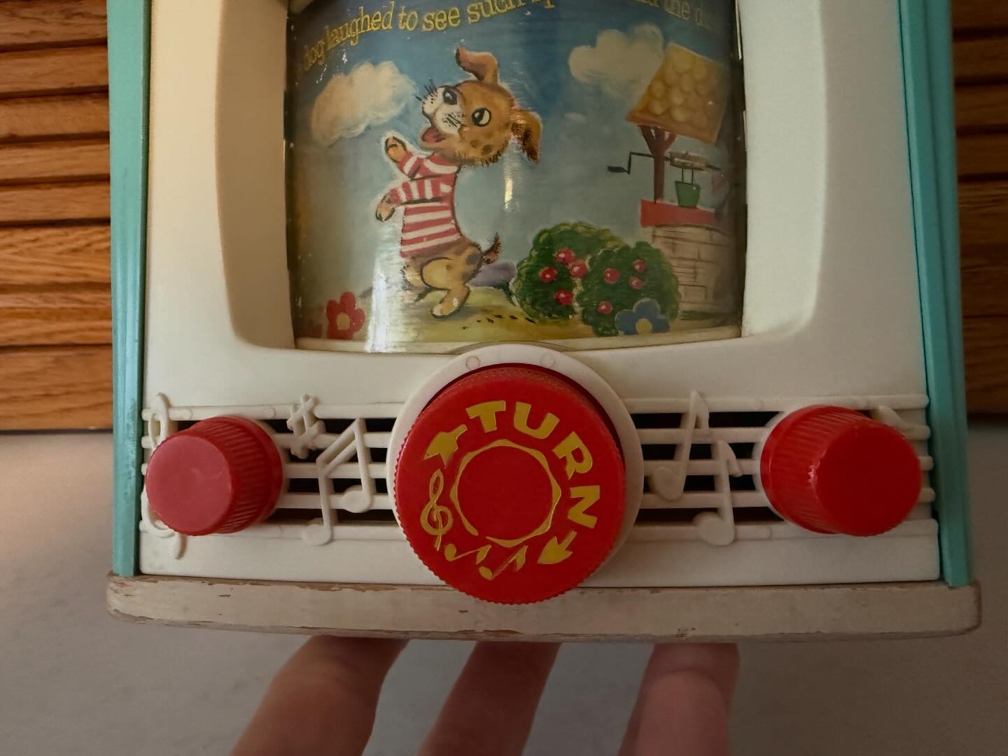 Fisher Price music box TV from the 60s. Complete wth Peek-a-boo screen