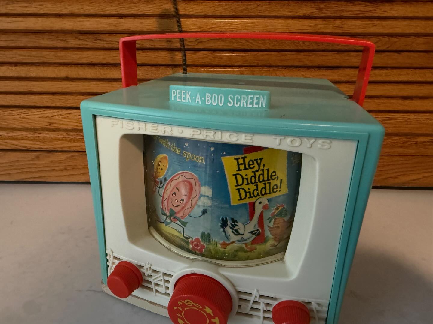 Fisher Price music box TV from the 60s. Complete wth Peek-a-boo screen