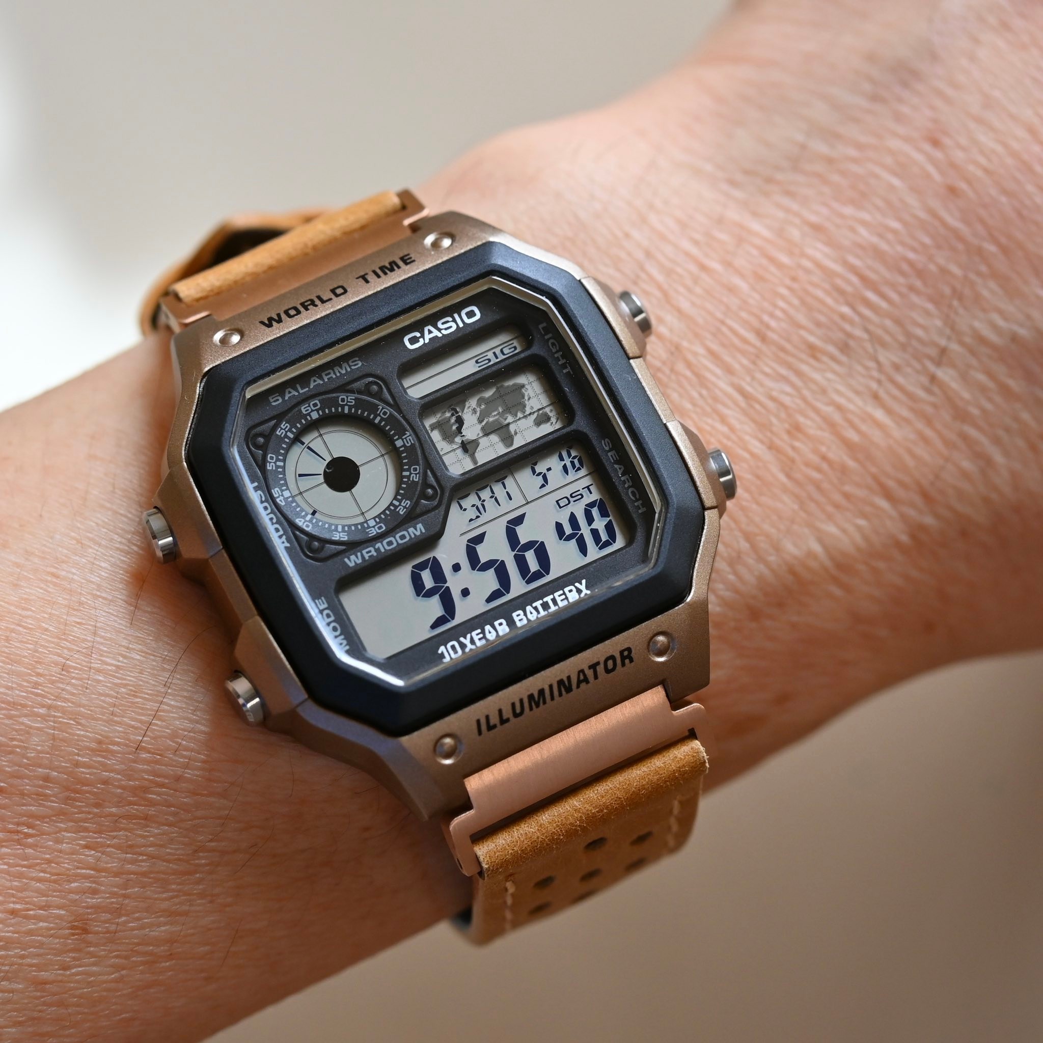 Casio Royale watch with rose-gold steel link and light brown