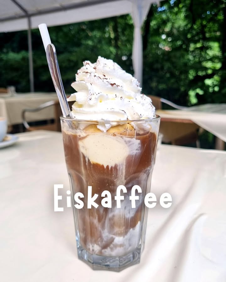Eiskaffee is not iced coffee — it's a proper dessert. Chilled coffee, vanilla ice cream, whipped cream, poured into a tall glass. This is what summer afternoons in Germany taste like. Recipe