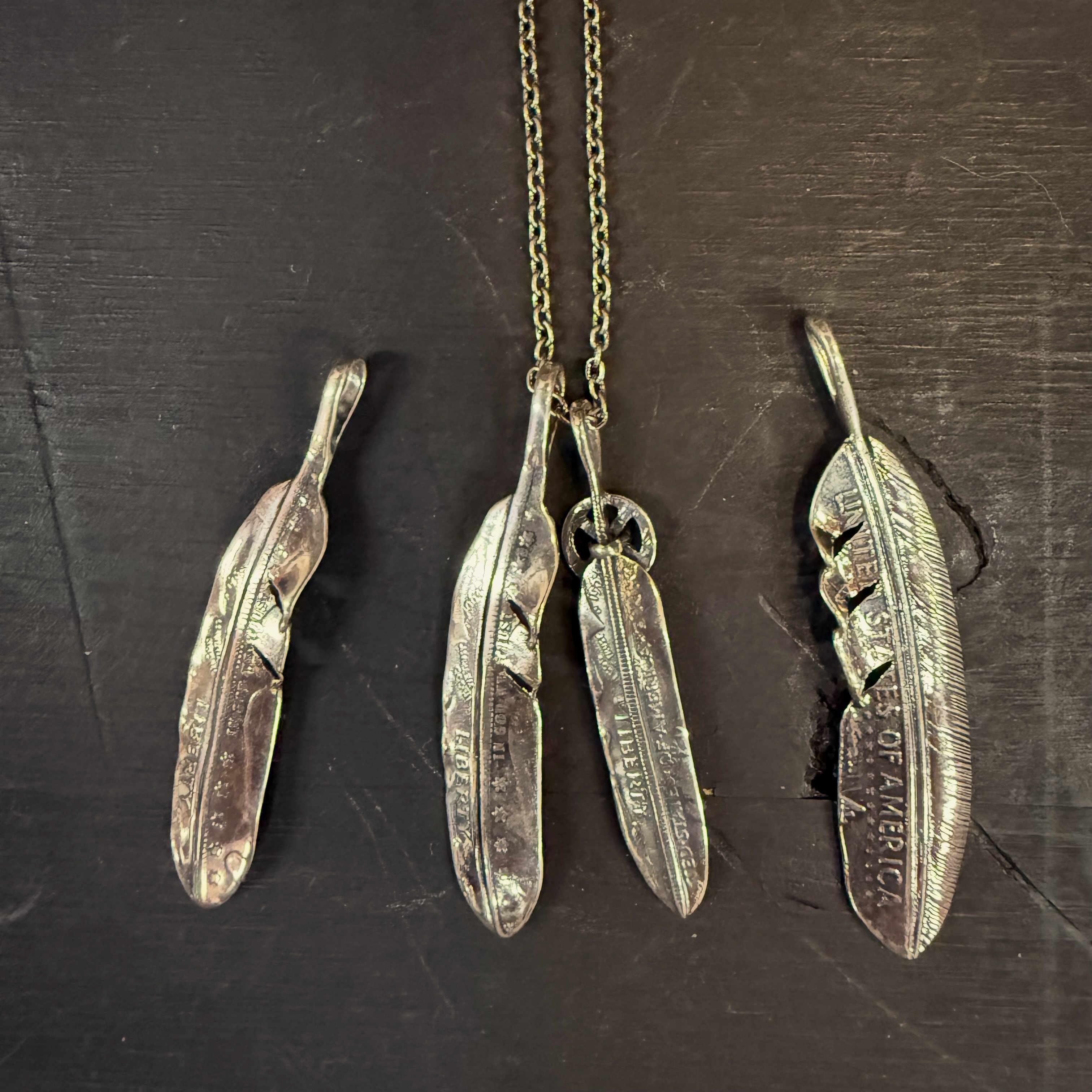 ?NORTH WORKS Feather top? アメリカのオールドコインから生まれる 