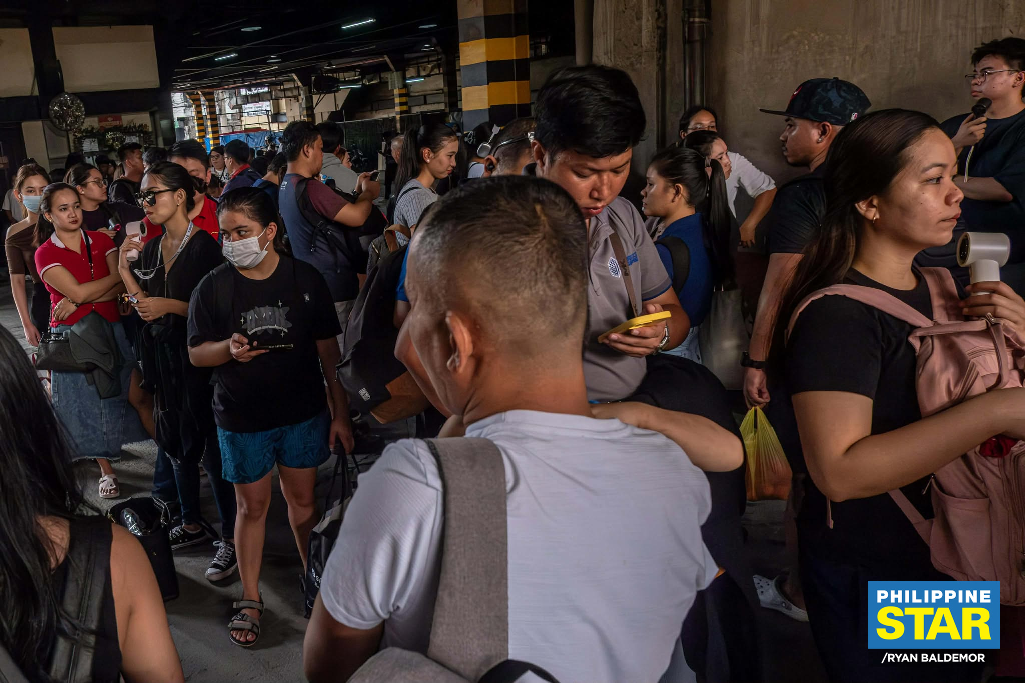 Philippine - Passengers flock to a bus terminal in Pasay City on ...