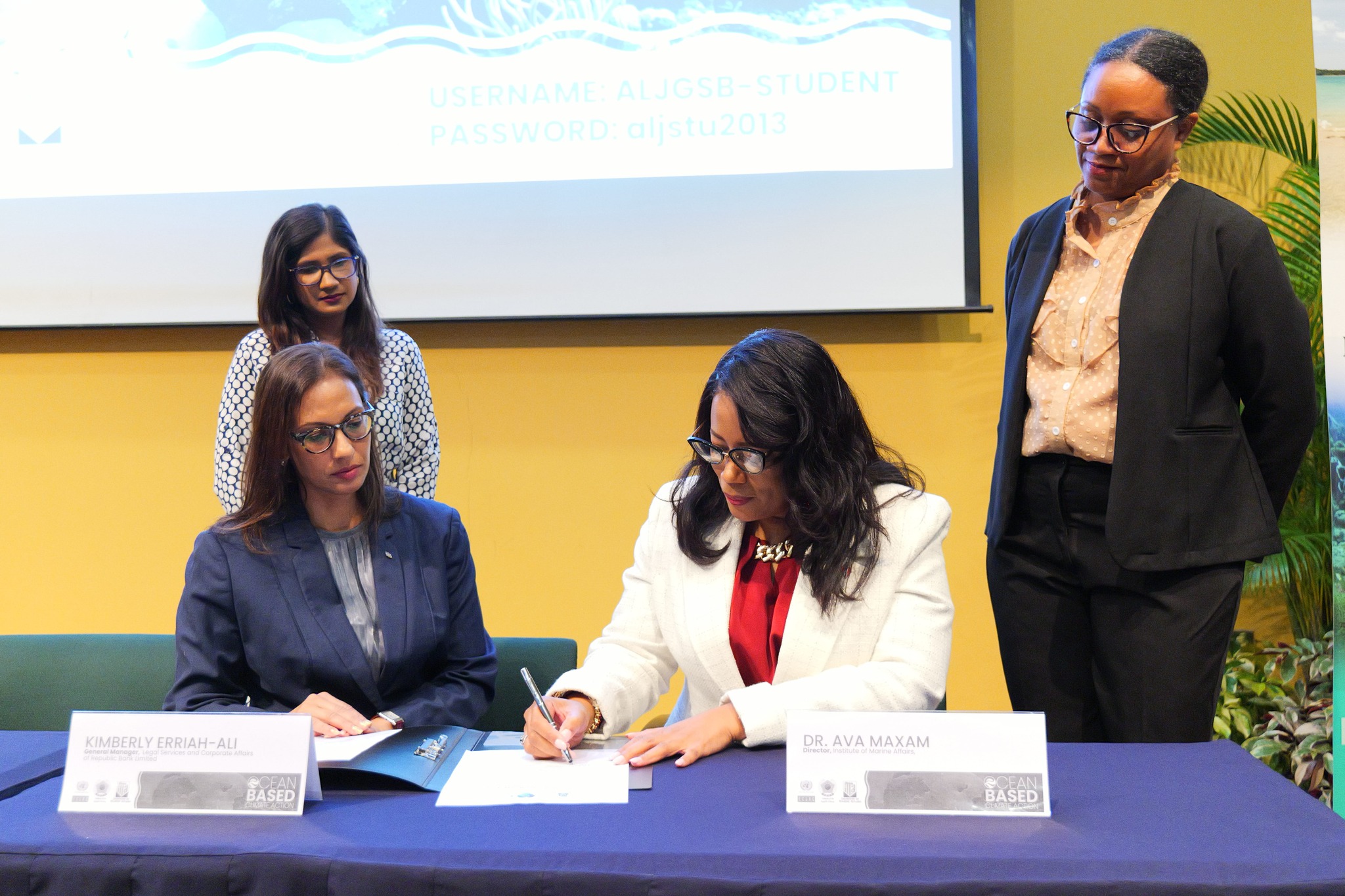 Institute - (Seated-R) Dr. Ava Maxam, Director of Institute of Marine ...
