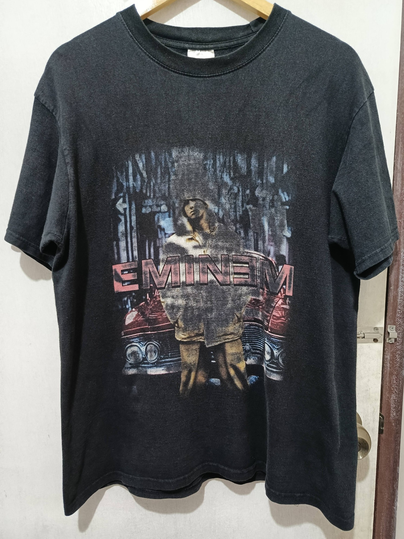 Eminem rap tee with pinholes and graphic fading for sale