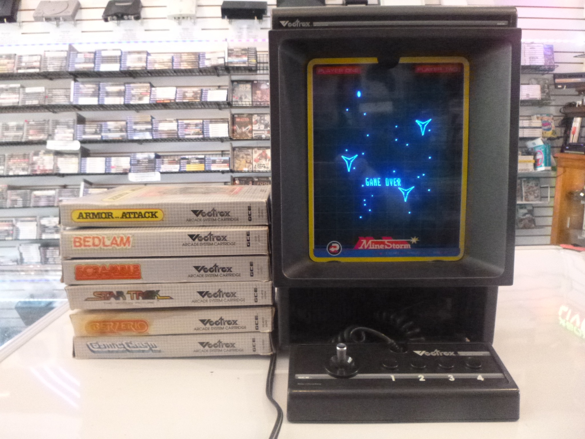 Unique Vectrex video game console with multi-cart overlay