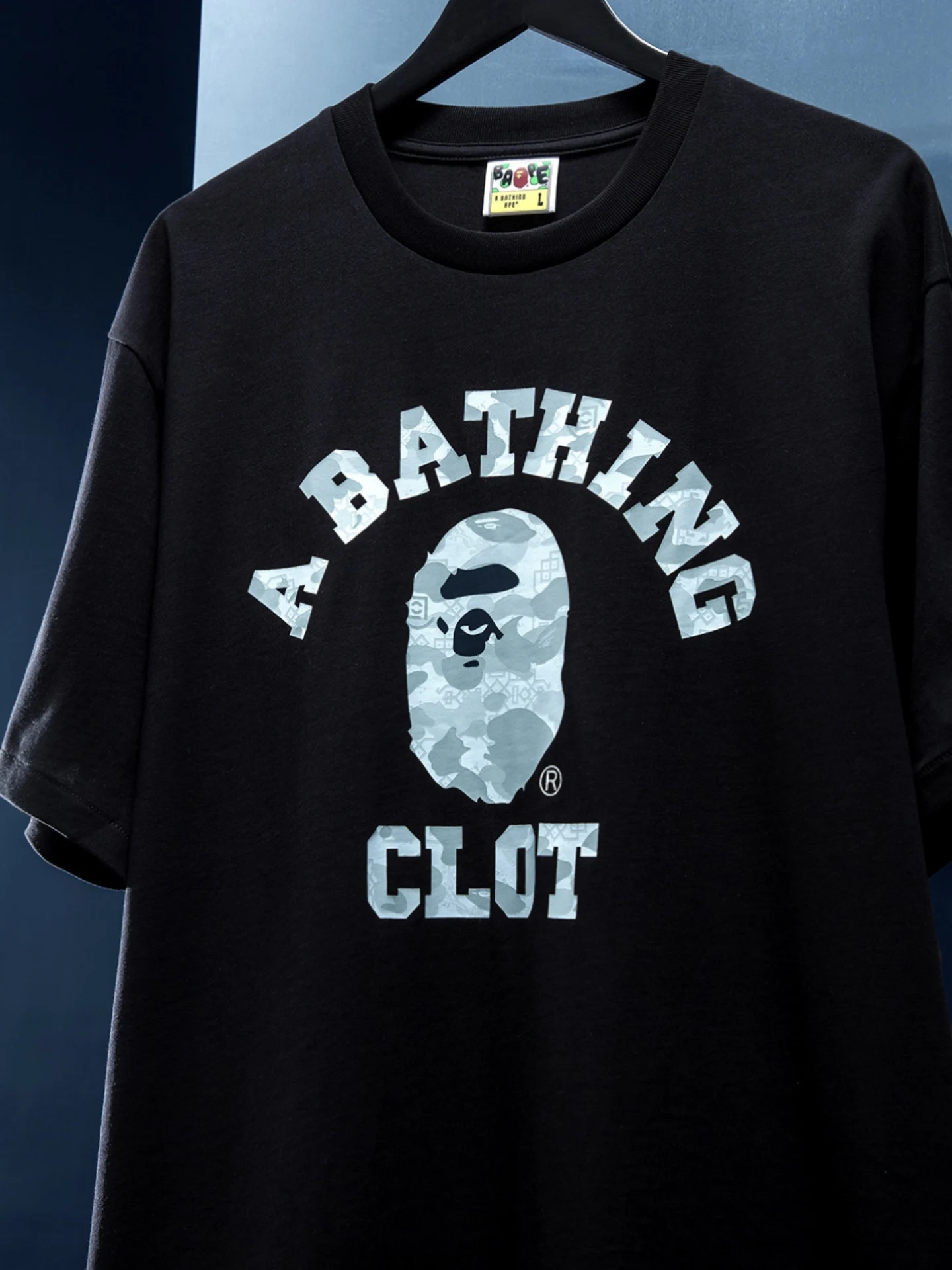 BAPE® x CLOT tee: Relaxed college style, collaborative camo all 