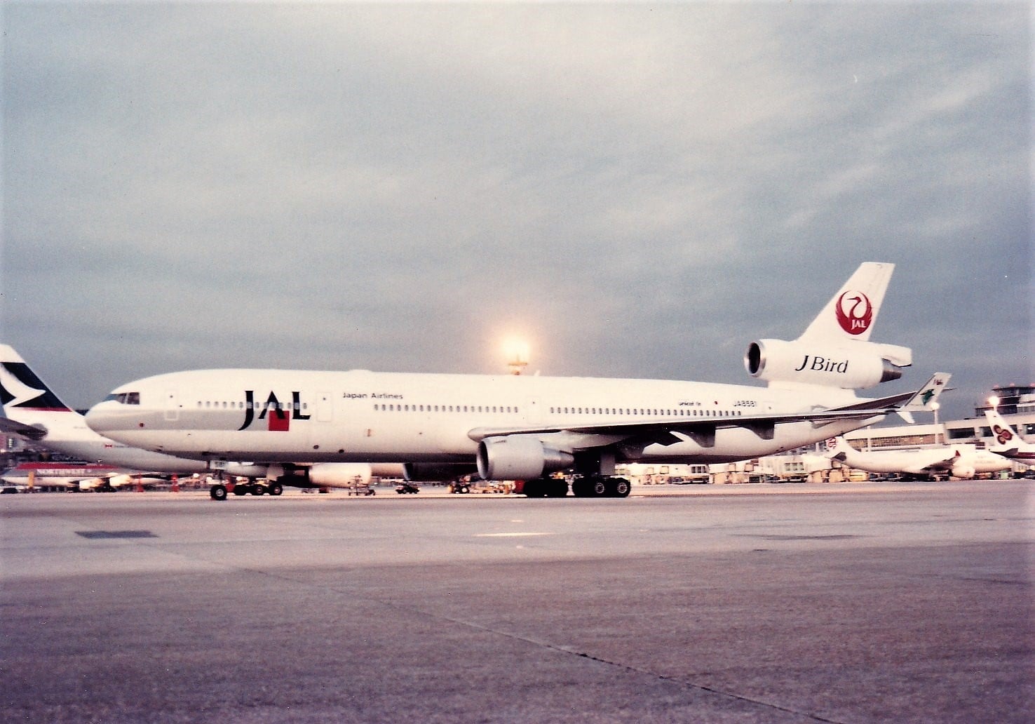 MD-11 JA-8580 of JAL 'J Bird' departs from 13 in 1997. My photo