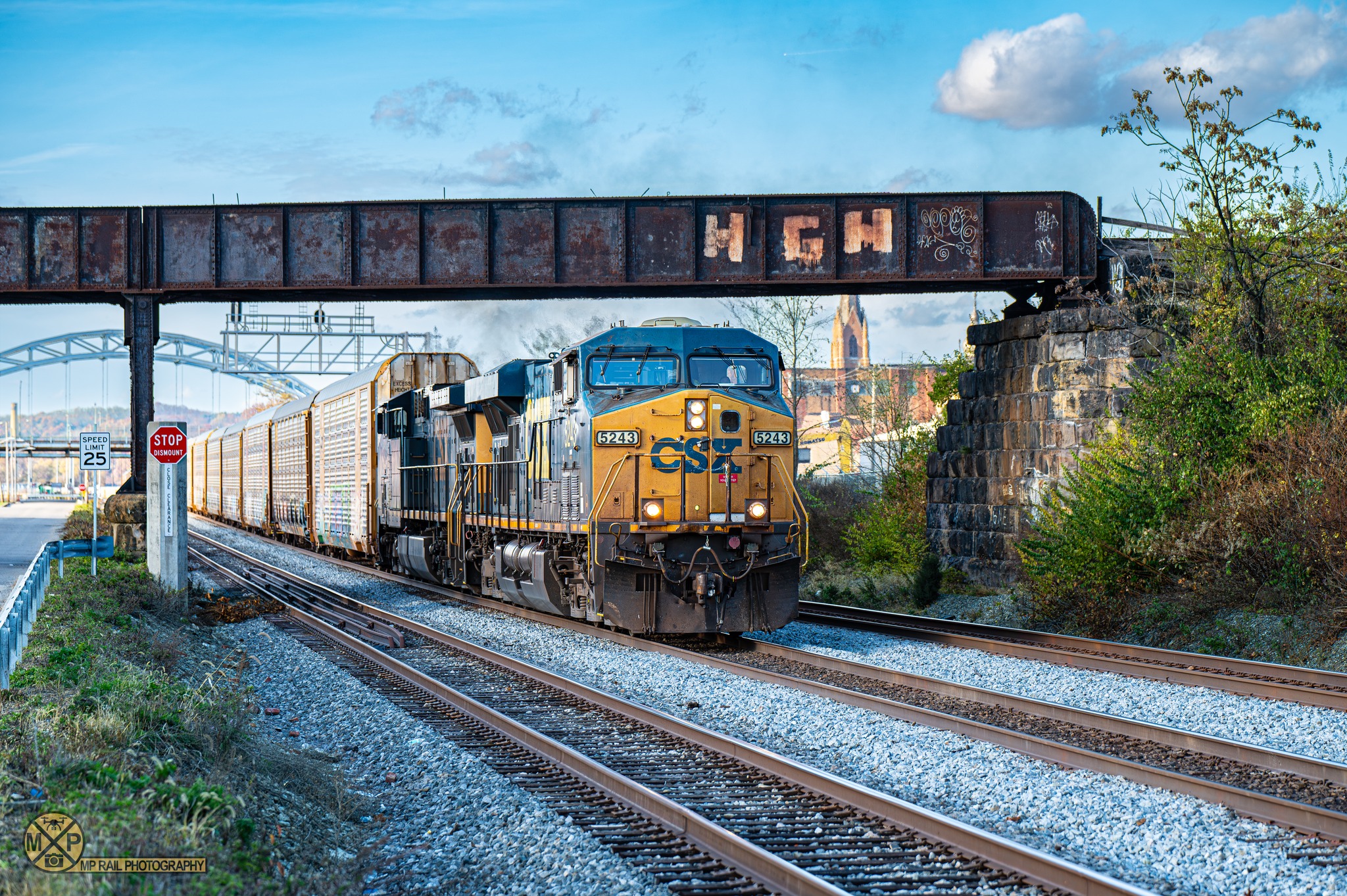 MP - A CSX autorack train passes under the Pittsburgh and Ohio Central ...