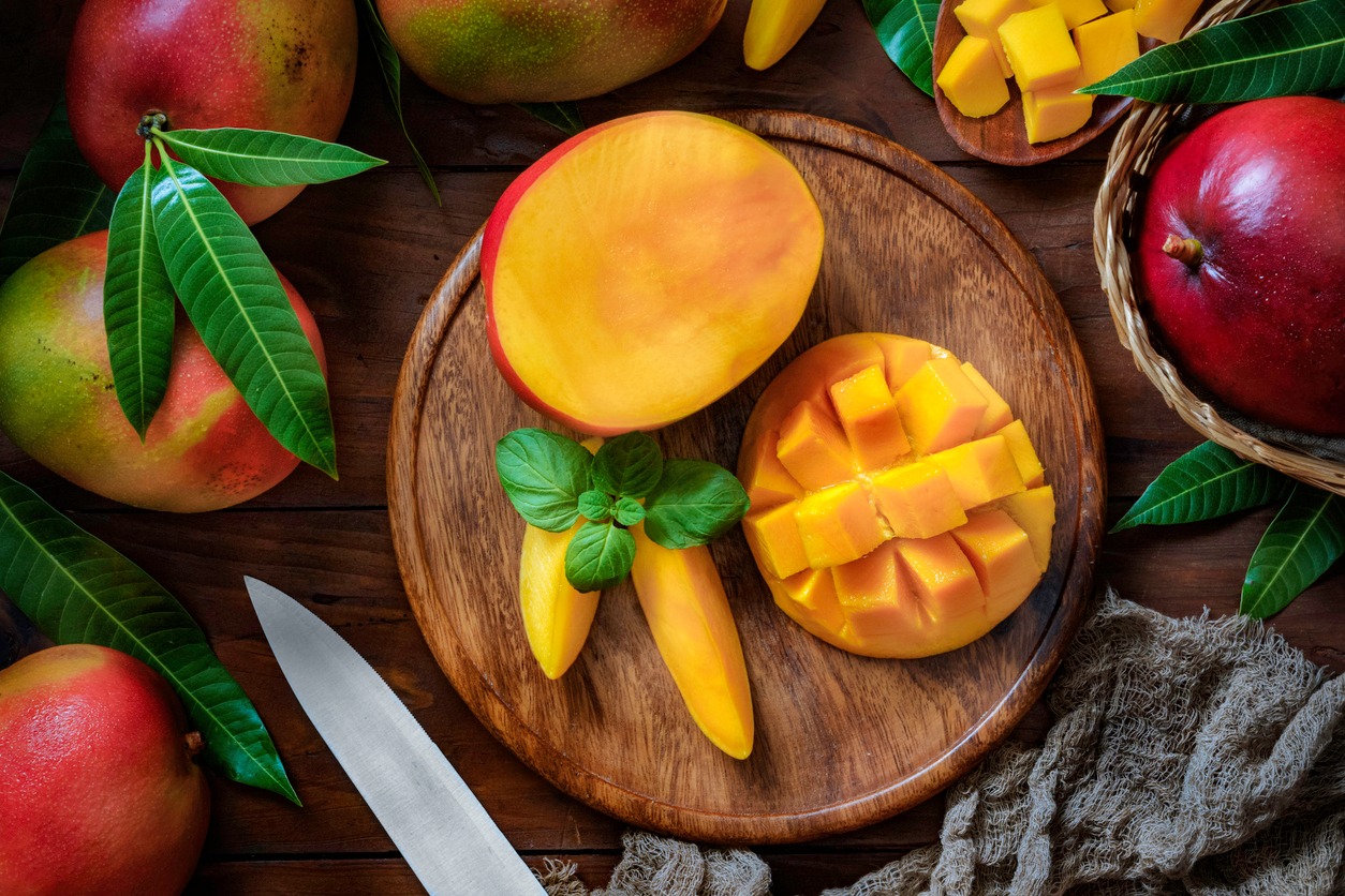 Saber - June is recognized as National Mango Month. Mangos come in ...