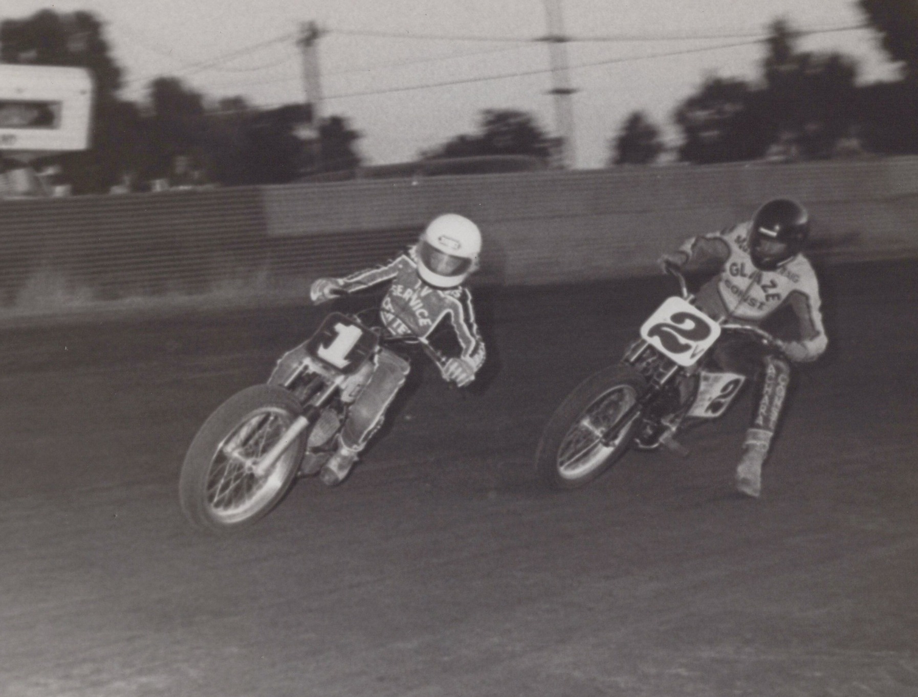 Rider - Chris Carr and Craig Scroggins run together in a heat race on ...