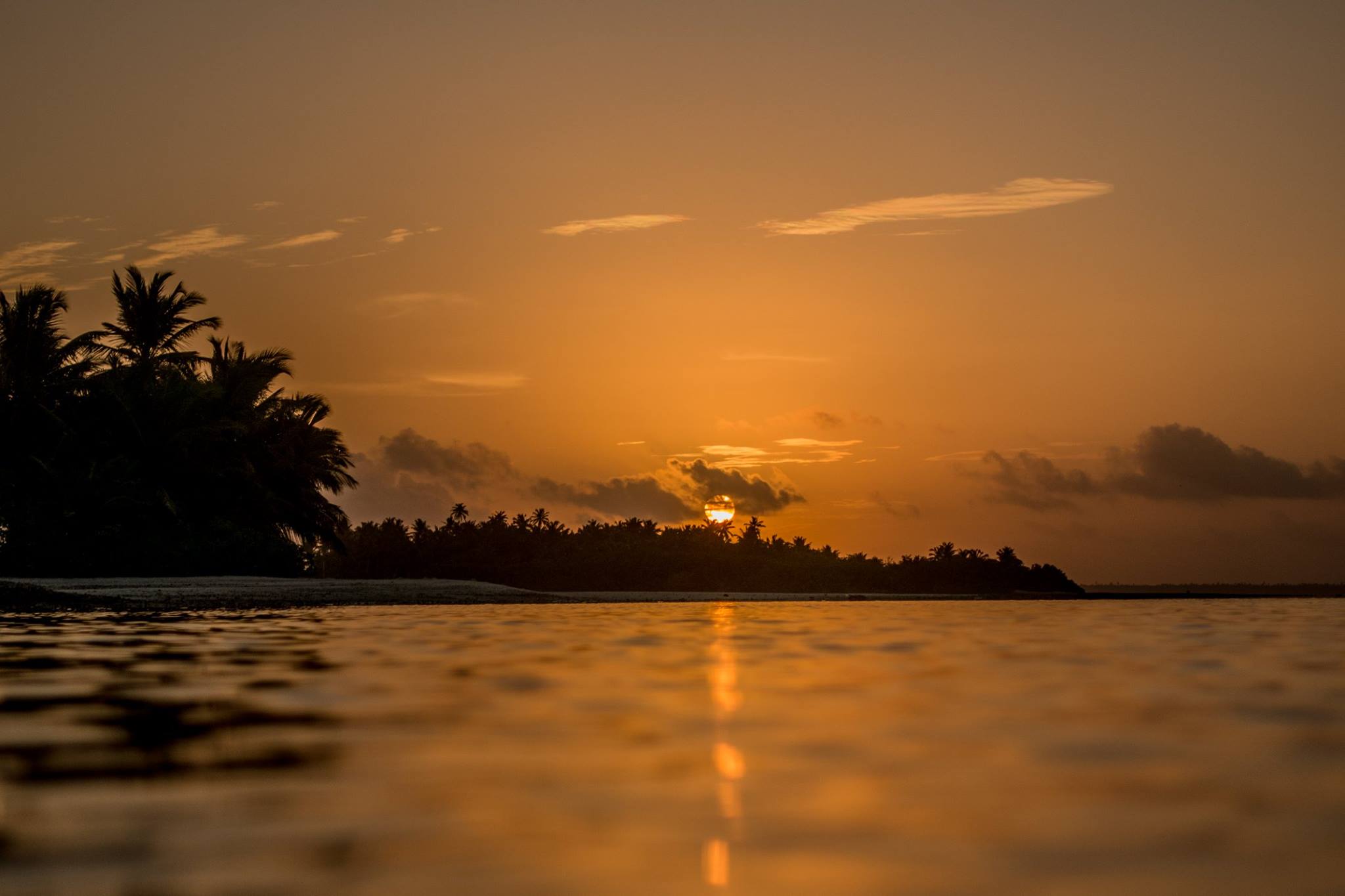 Cocos Keeling Islands Visitor Centre - Watching the sun dip below the ...