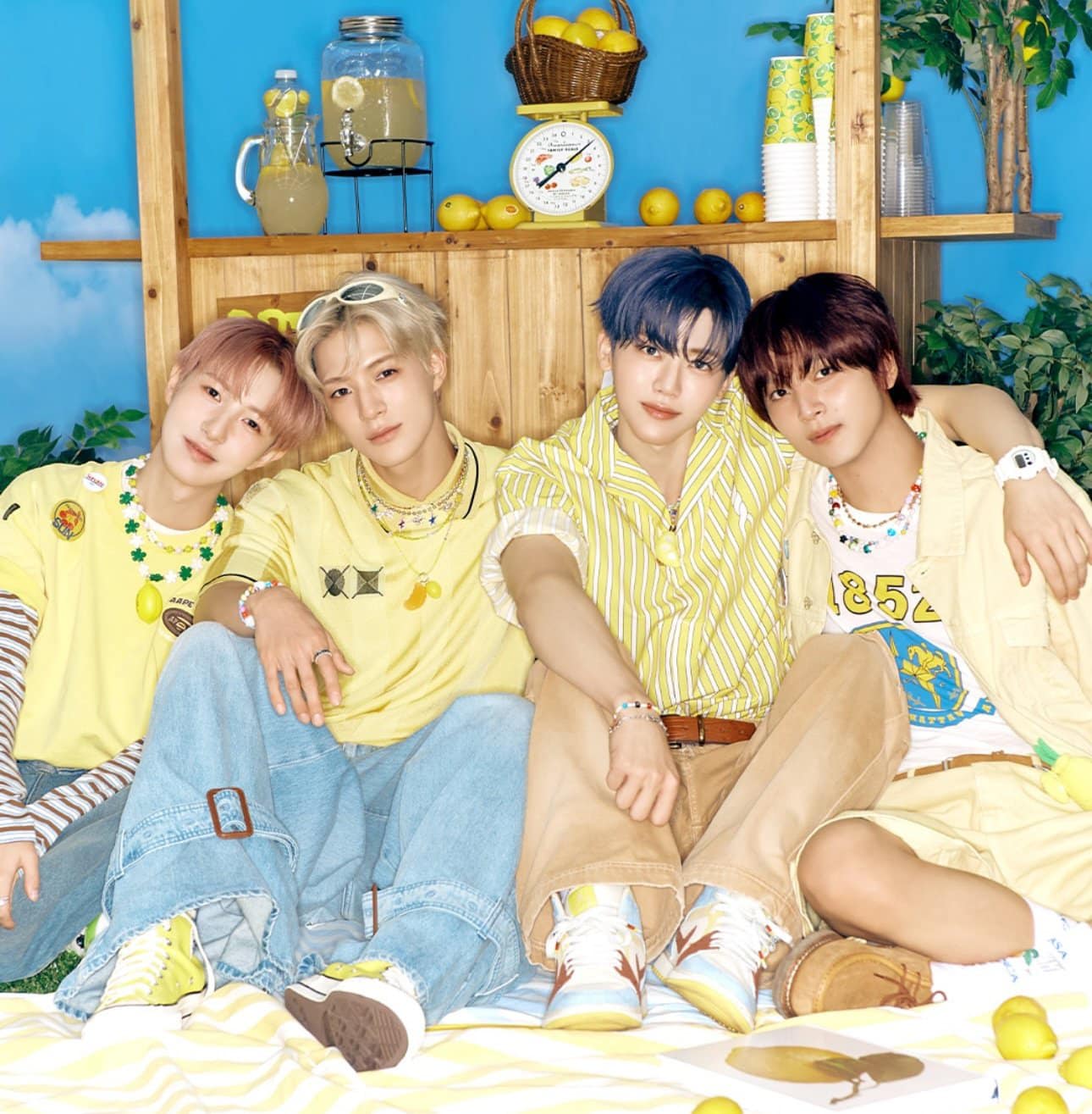 NCT DREAM, WayV, NCT WISH, and NCT 127 group photos from their