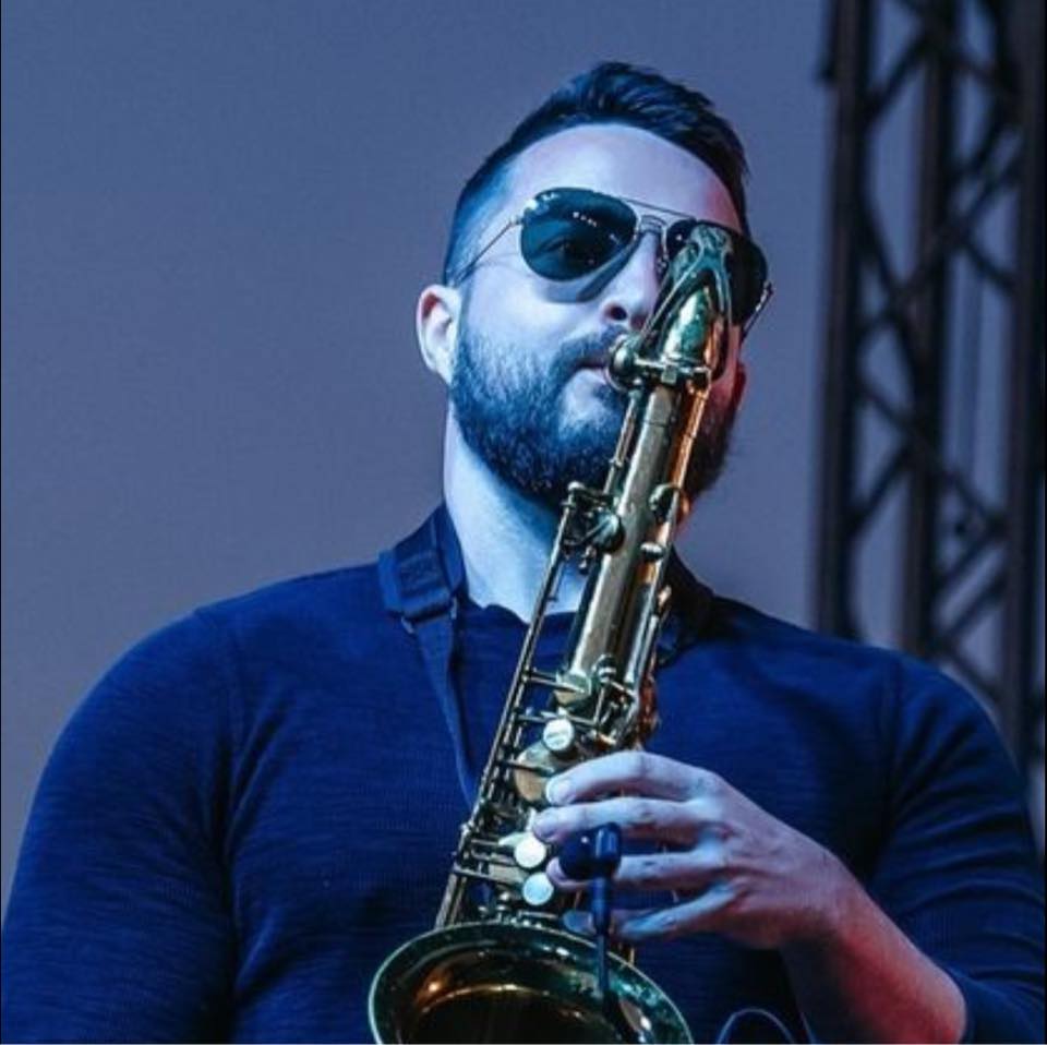 Eric - Stock photo of a sax player. Not sure he knows what he's doing ...