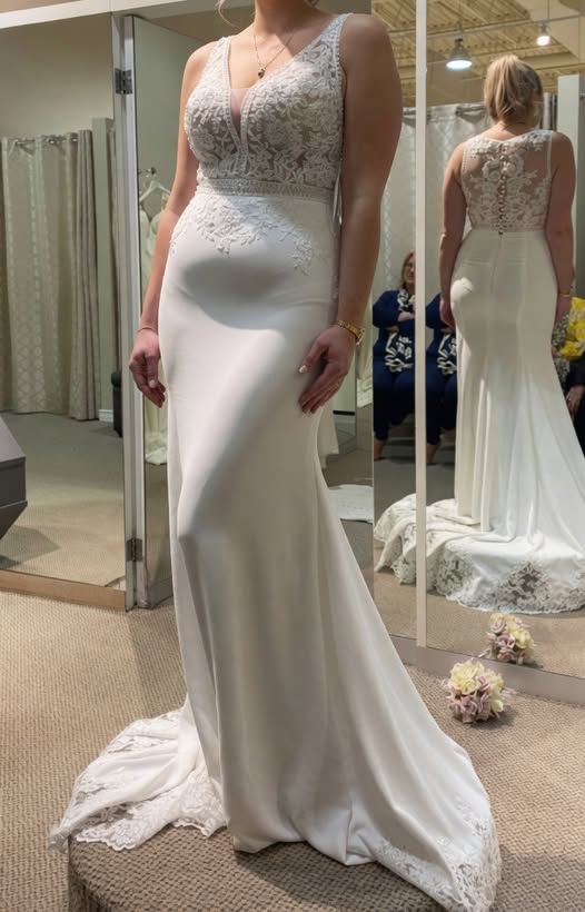 My wedding dressThis is a sample size, I know that it's too tight on me lolIt's a little tight but overall what do you guys think? I love it!!