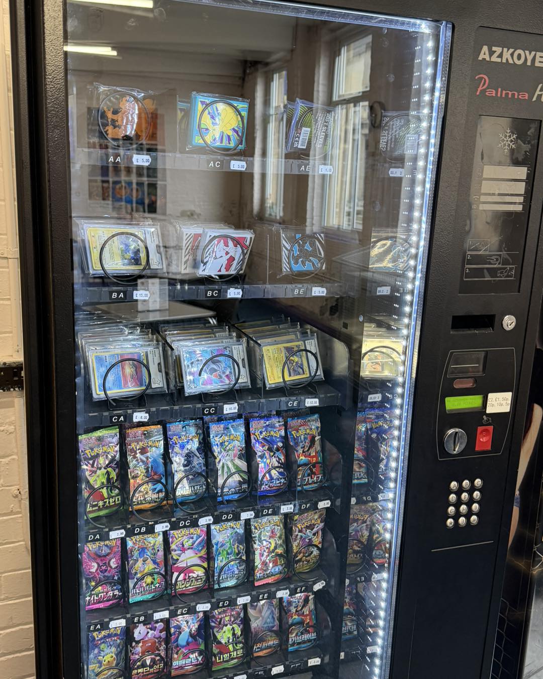 🤖 Busy day restocking Gemini's card game vending machine 🤖 It's